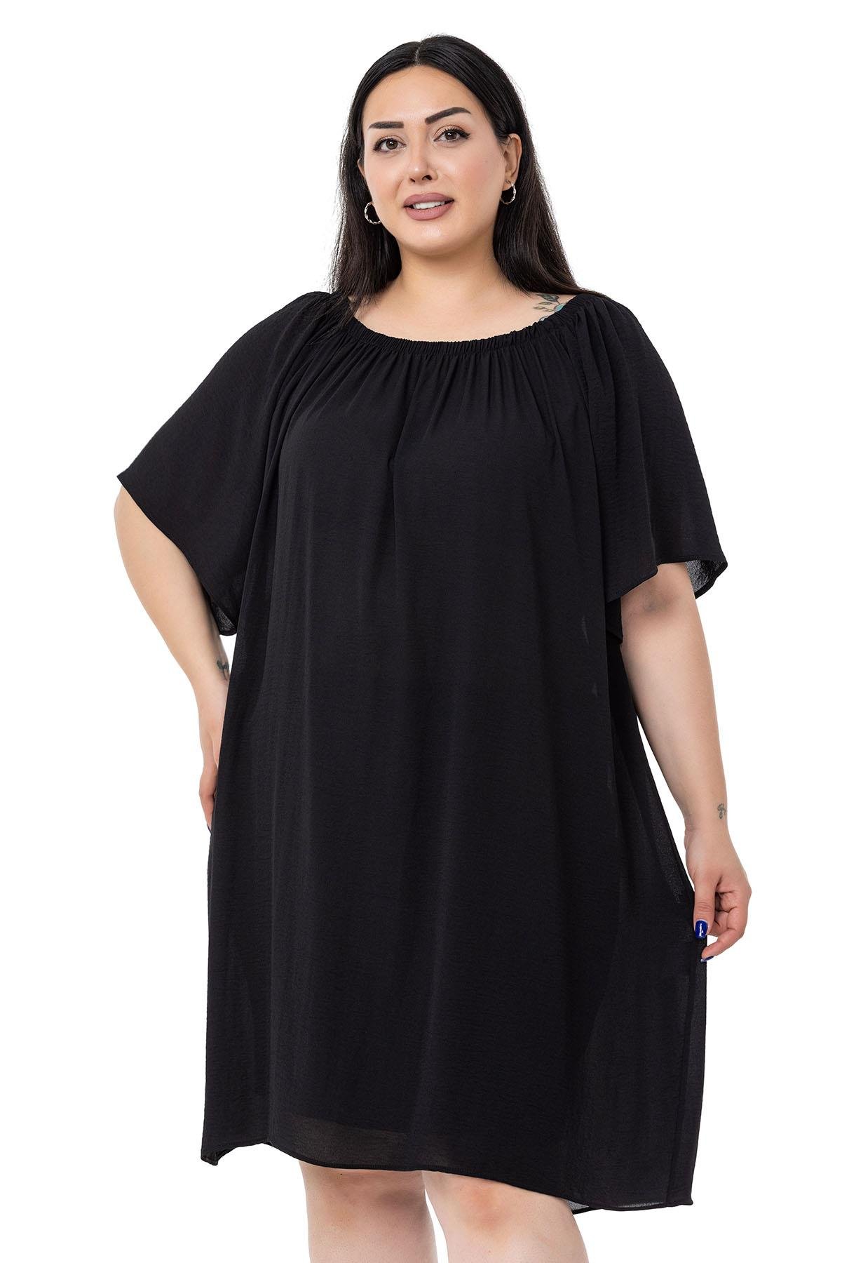 DISENTIS MODETS GENC BUYUK BEDEN ASTARLI ELBISEDISENTIS MODESTBüyük Beden Yakası Lastikli Geniş Kollu Astarlı Siyah Elbise