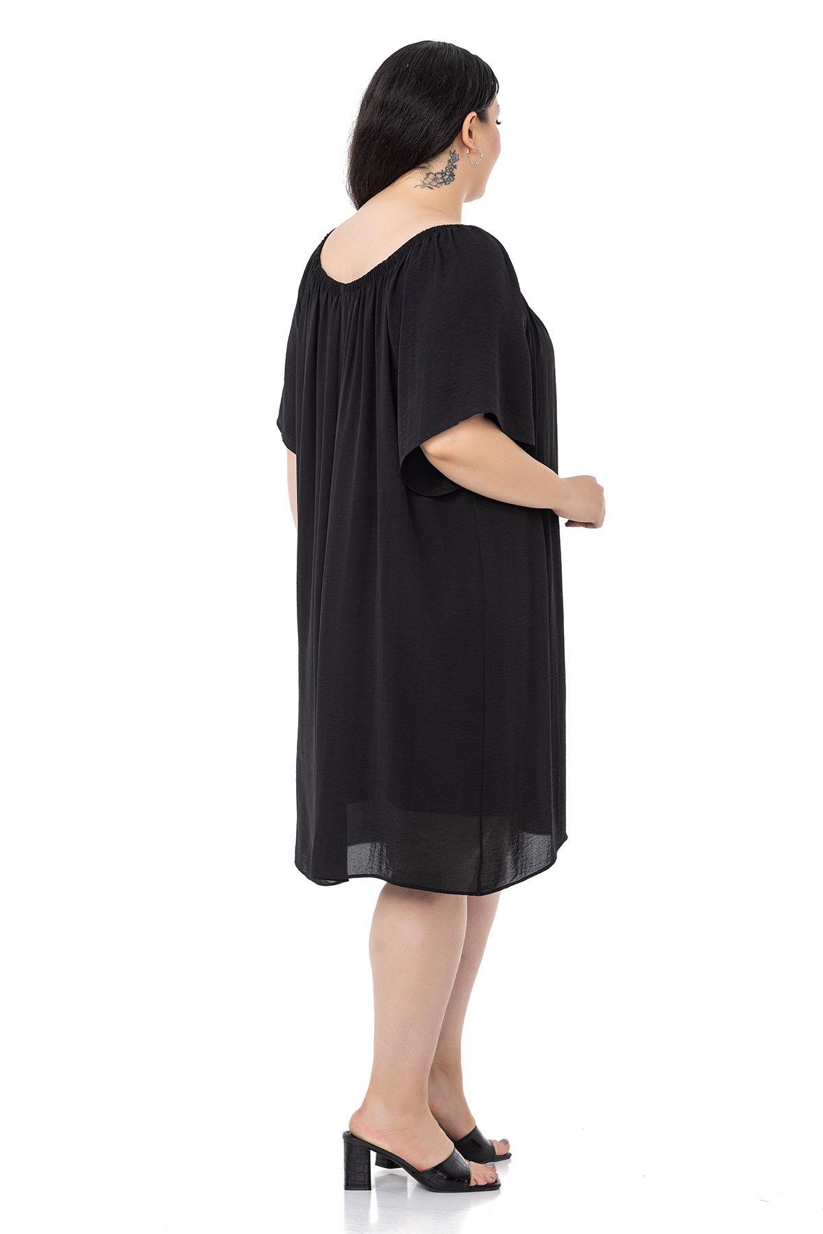 DISENTIS MODETS GENC BUYUK BEDEN ASTARLI ELBISEDISENTIS MODESTBüyük Beden Yakası Lastikli Geniş Kollu Astarlı Siyah Elbise