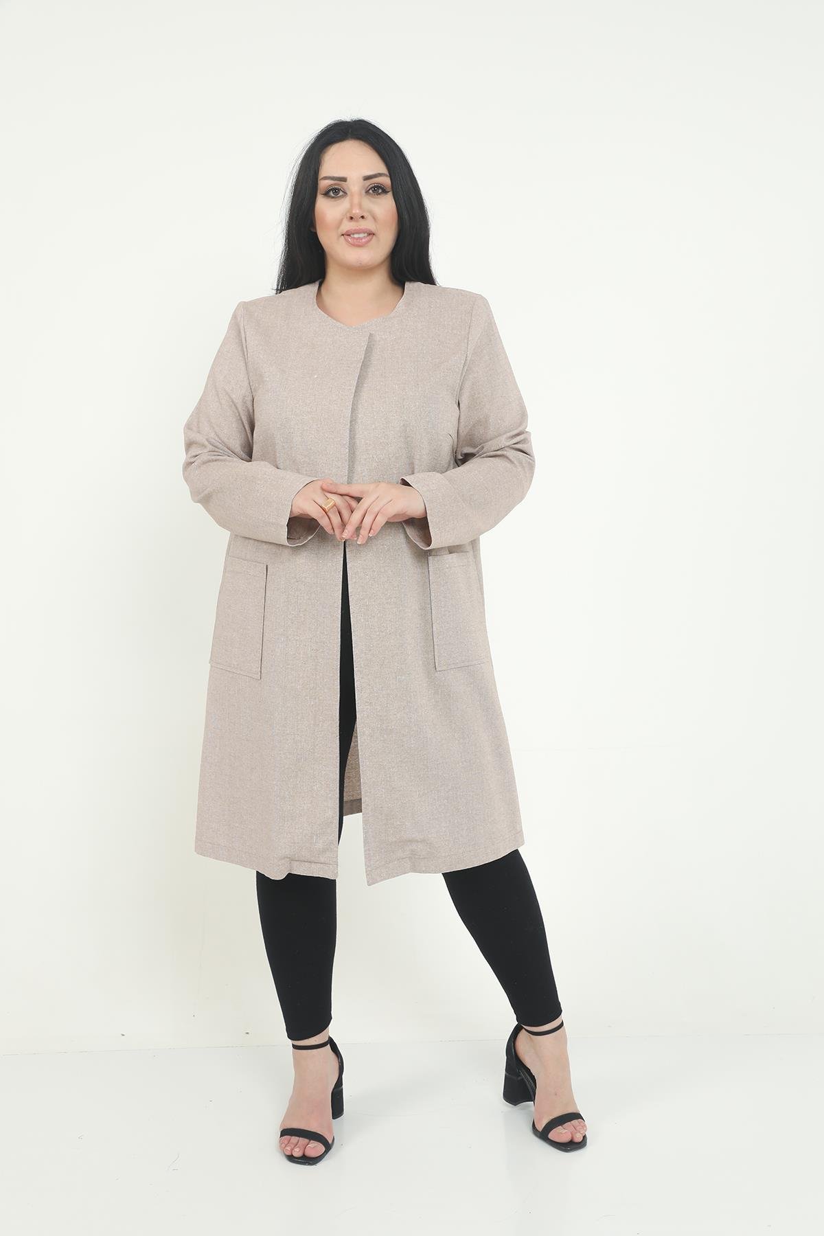 CeketYuvarlak Yaka Astarsız Cepli Kum Rengi CeketdisentisYuvarlak Yaka Astarsız Cepli Kum Rengi Ceket