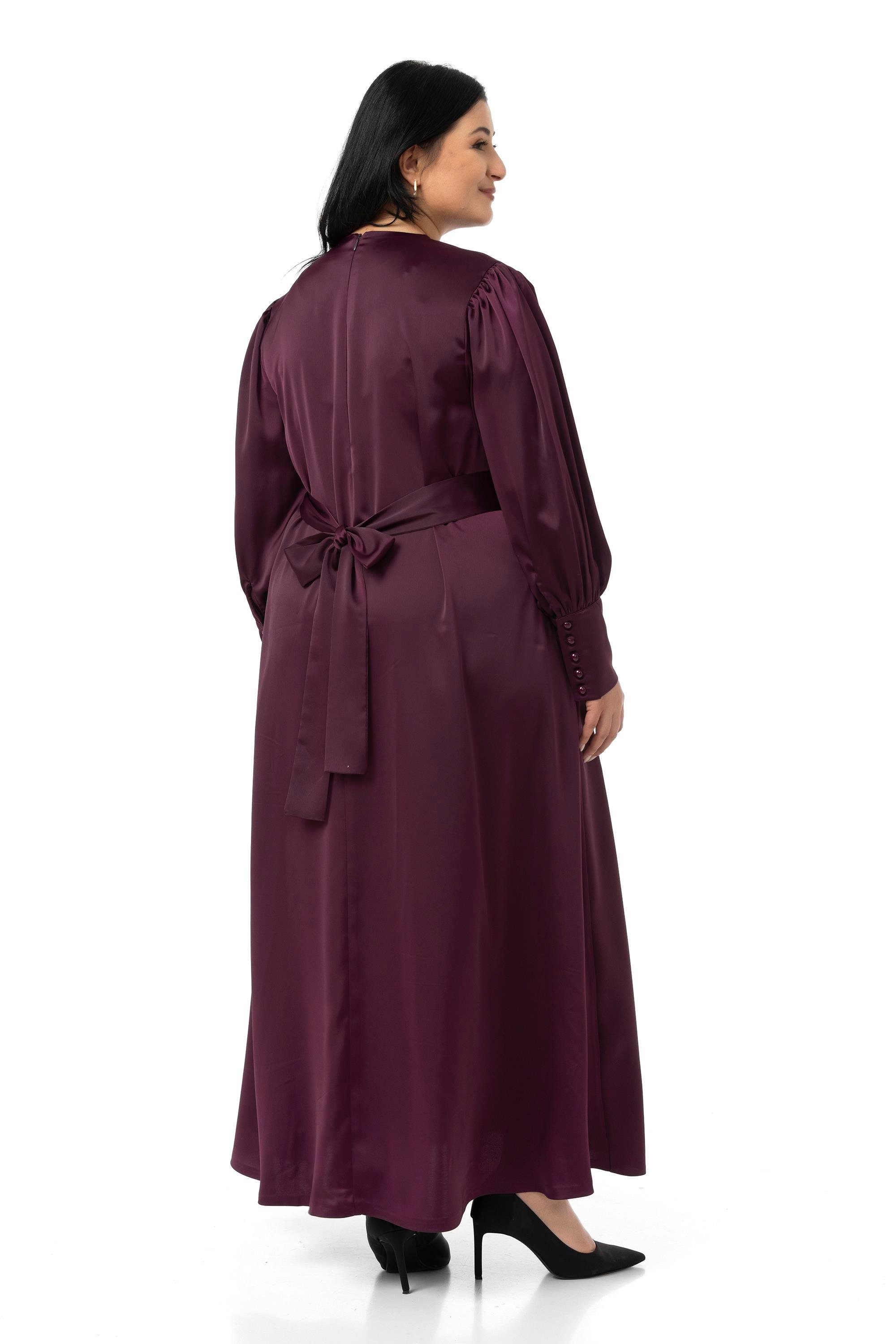 ELBİSEDisentis Modest Büyük Beden Büzgülü Kollu Kuşak Detaylı Uzun Saten Mürdüm ElbiseDISENTIS MODESTBüyük Beden Büzgülü Kollu Kuşak Detaylı Uzun Saten Mürdüm Elbise