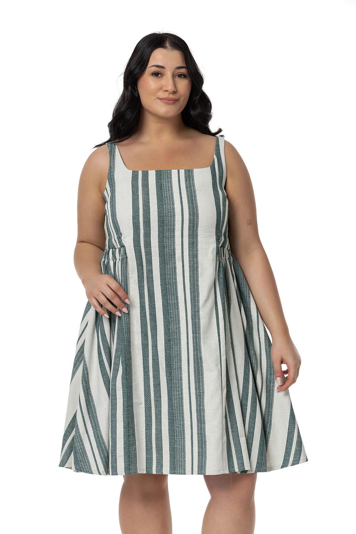 ELBİSEDisentis Modest Büyük Beden Yanlarda Büzgü ve Arkada Bağlama Detaylı Keten Mini Yeşil Elbise DISENTIS MODESTBüyük Beden Yanlarda Büzgü ve Arkada Bağlama Detaylı Keten Mini Yeşil Elbise 