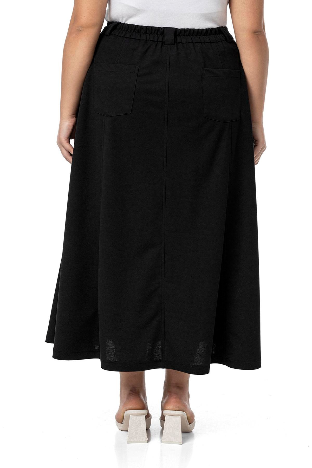 EtekDisentis Modest Büyük Beden Yanlardan Yırtmaçlı Beli Arkadan Lastikli Midi Siyah EtekDISENTIS MODESTBüyük Beden Yanlardan Yırtmaçlı Beli Arkadan Lastikli Midi Siyah Etek