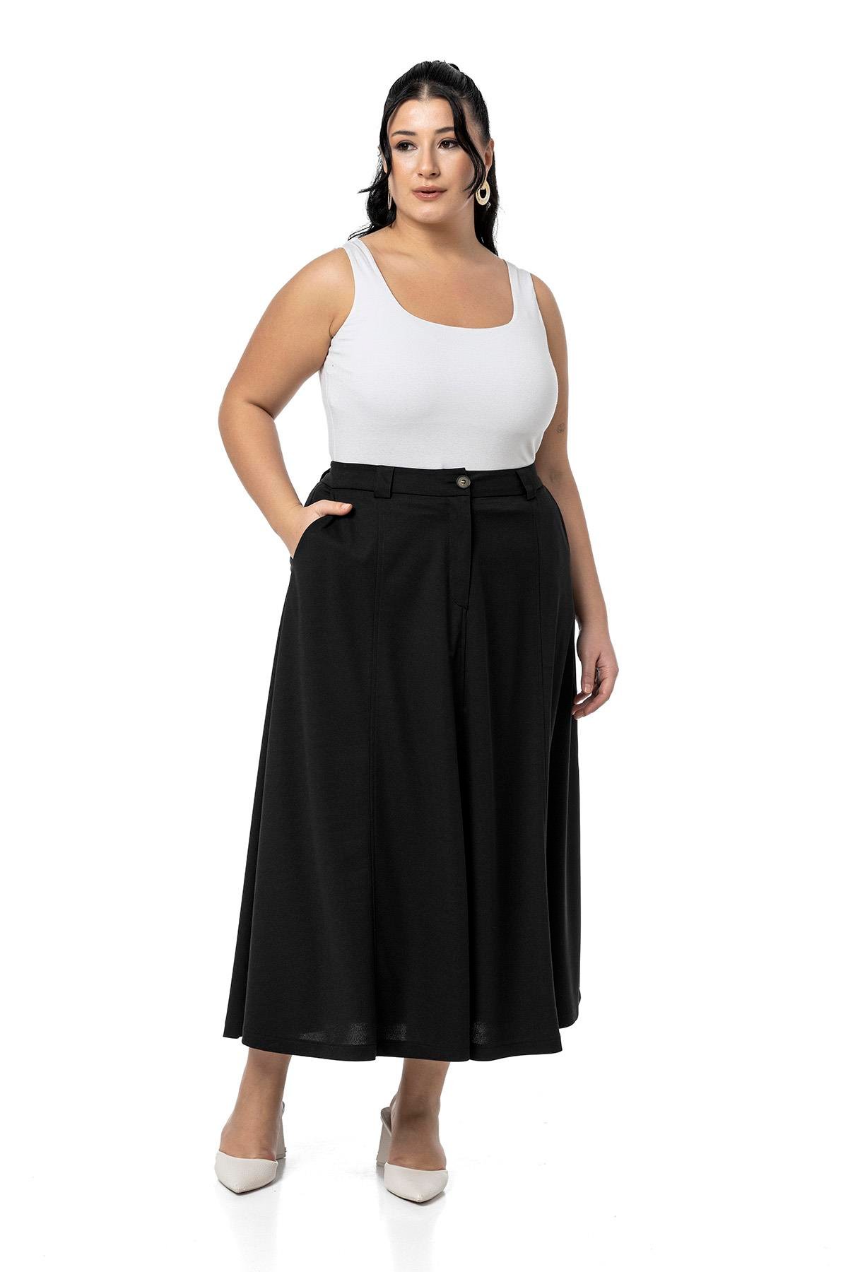 EtekDisentis Modest Büyük Beden Yanlardan Yırtmaçlı Beli Arkadan Lastikli Midi Siyah EtekDISENTIS MODESTBüyük Beden Yanlardan Yırtmaçlı Beli Arkadan Lastikli Midi Siyah Etek