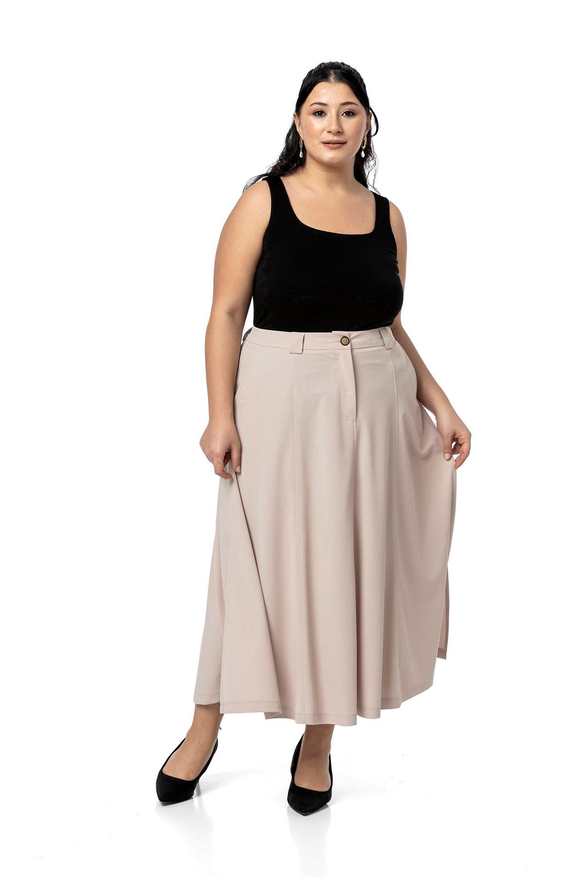 EtekDisentis Modest Büyük Beden Yanlardan Yırtmaçlı Beli Arkadan Lastikli Midi Bej Rengi EtekDISENTIS MODESTBüyük Beden Yanlardan Yırtmaçlı Beli Arkadan Lastikli Midi Bej Rengi Etek