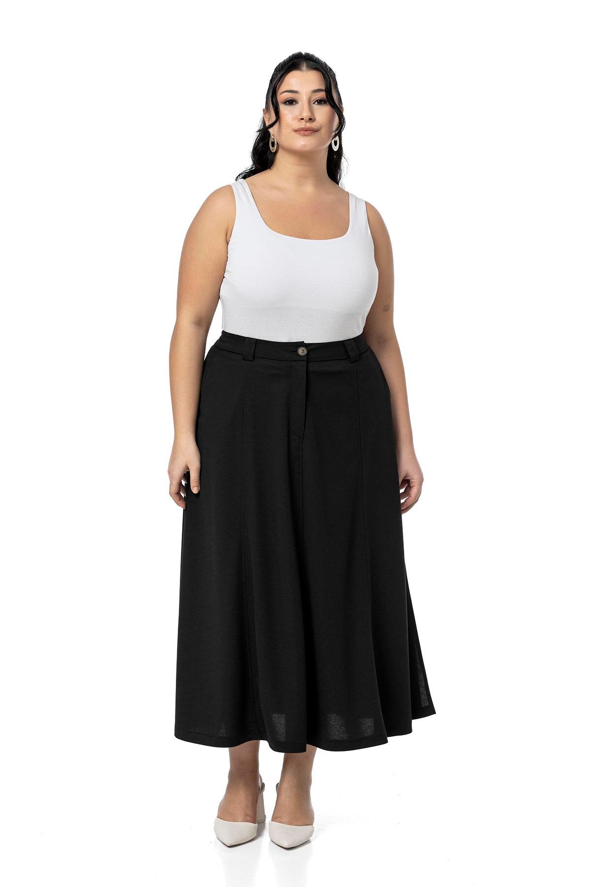 EtekDisentis Modest Büyük Beden Yanlardan Yırtmaçlı Beli Arkadan Lastikli Midi Siyah EtekDISENTIS MODESTBüyük Beden Yanlardan Yırtmaçlı Beli Arkadan Lastikli Midi Siyah Etek