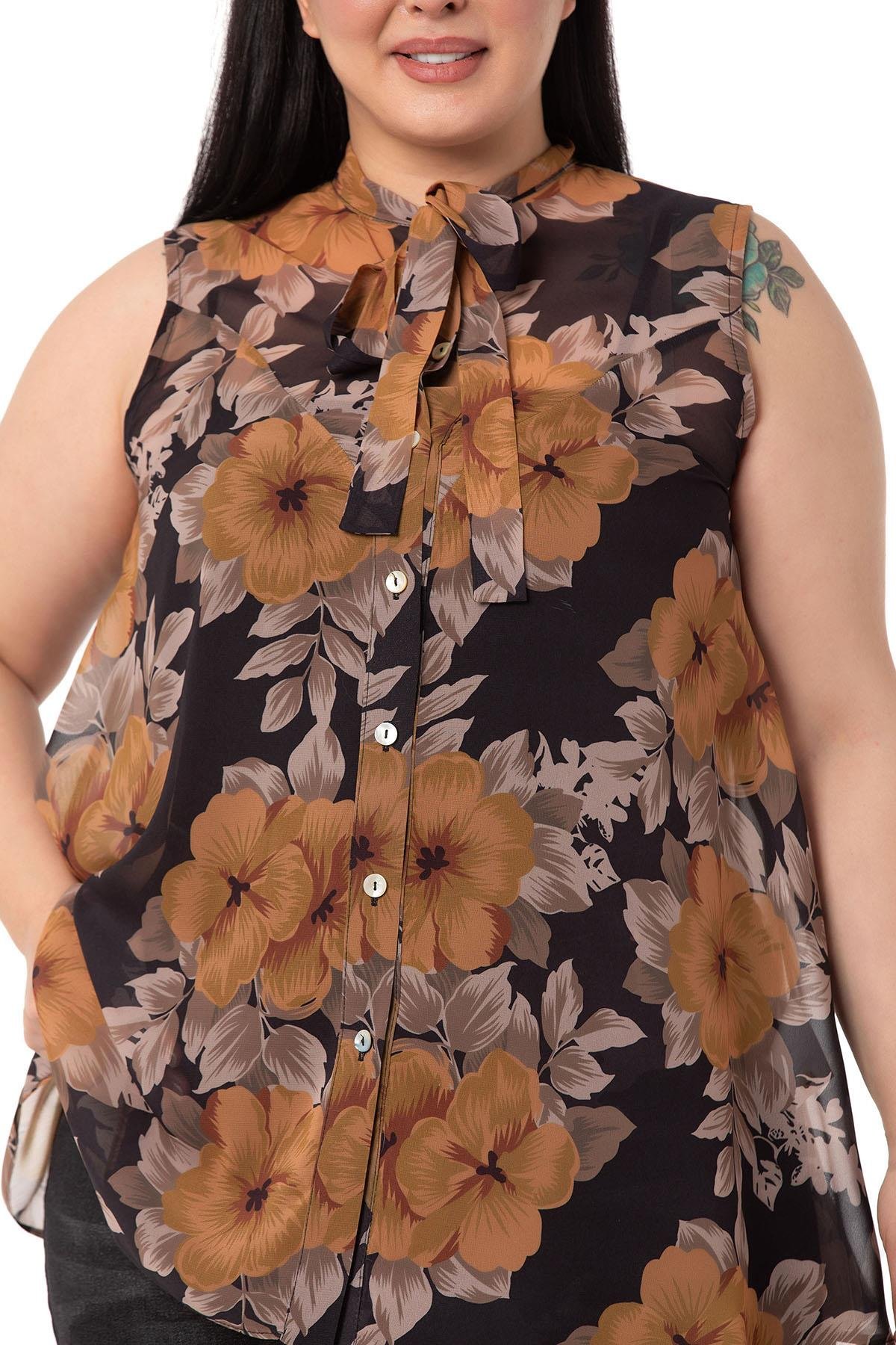 ShirtsDISENTIS GENC BUYUK BEDEN BIGSIZE SIFON GOMLEK KOLSUZ GOMLEKDISENTIS MODESTBüyük Beden Kendinden Fularlı Kolsuz Çiçek Desenli Şifon Hardal Gömlek