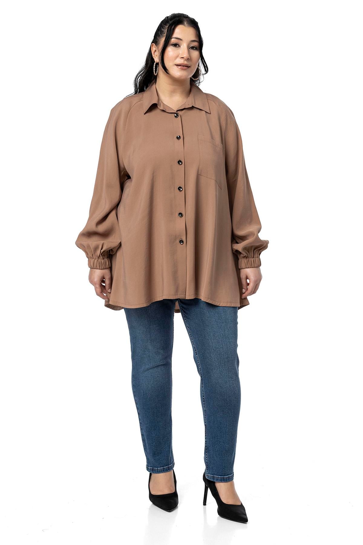 GömlekDisentis Modest Büyük Beden Kol Ağzı Lastikli Geniş Kesim Reglan Kol Vizon GömlekDISENTIS MODESTBüyük Beden Kol Ağzı Lastikli Geniş Kesim Reglan Kol Vizon Gömlek