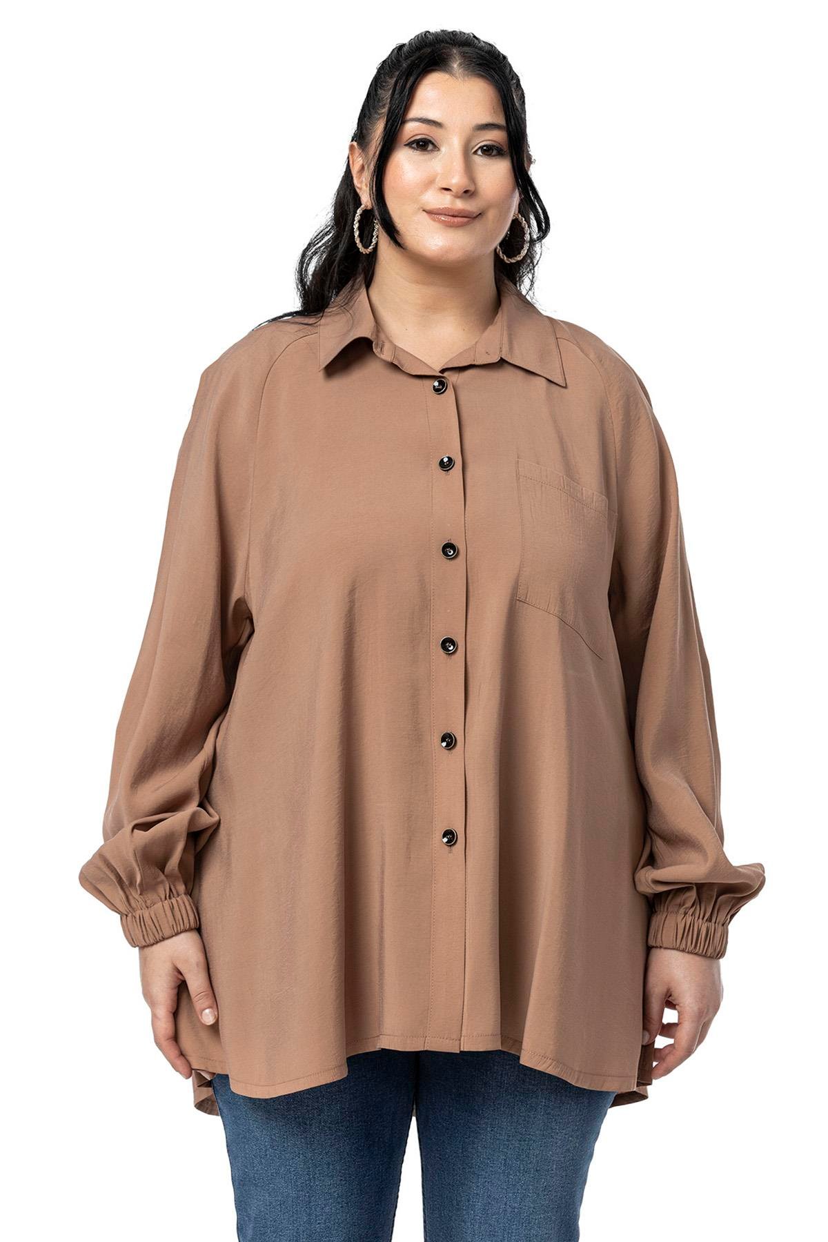 GömlekDisentis Modest Büyük Beden Kol Ağzı Lastikli Geniş Kesim Reglan Kol Vizon GömlekDISENTIS MODESTBüyük Beden Kol Ağzı Lastikli Geniş Kesim Reglan Kol Vizon Gömlek