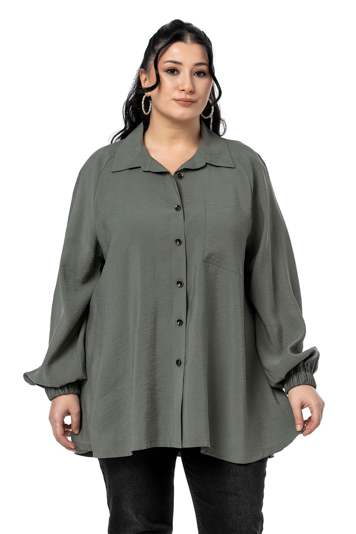 ShirtsDisentis Modest Büyük Beden Kol Ağzı Lastikli Geniş Kesim Reglan Kol Haki GömlekDISENTIS MODESTBüyük Beden Kol Ağzı Lastikli Geniş Kesim Reglan Kol Haki Gömlek
