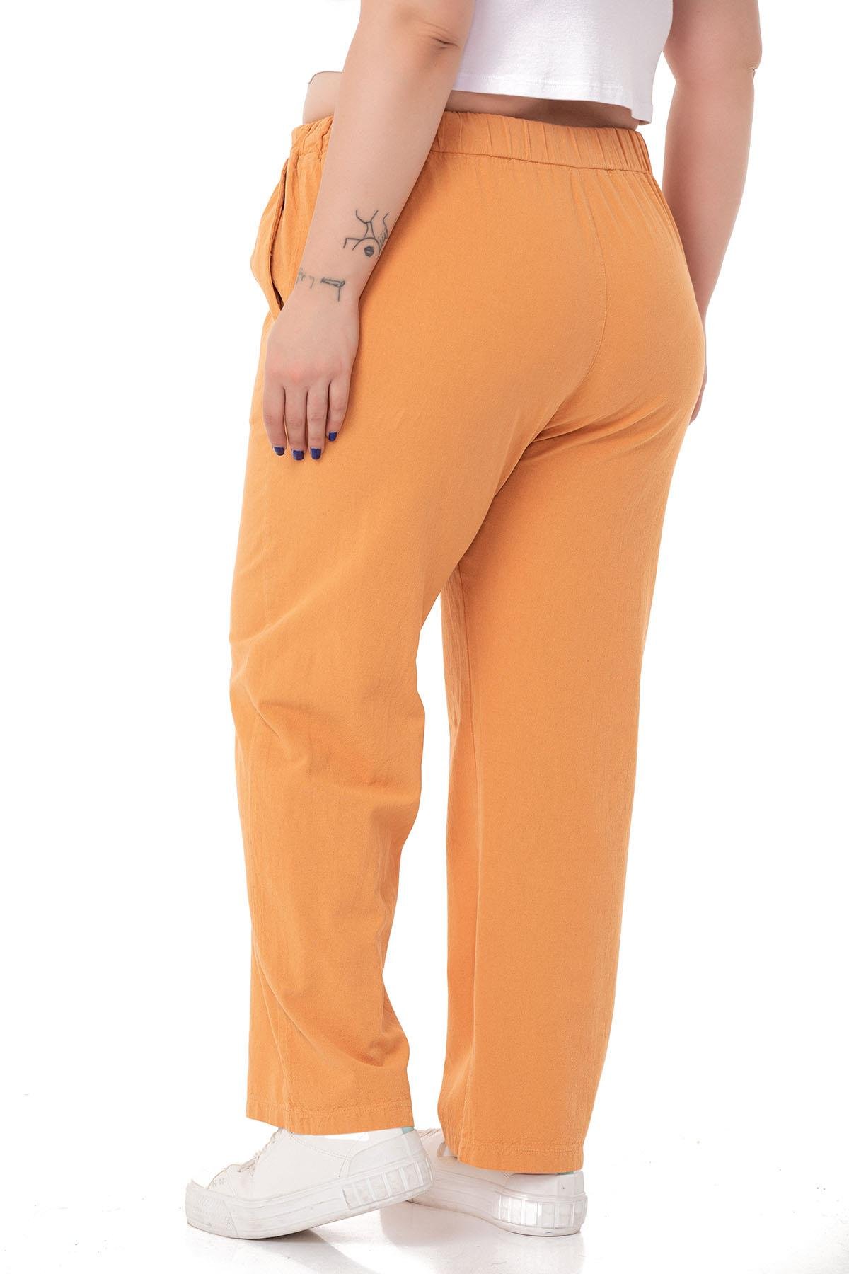 PantolonDISENTIS MODEST GENC BUYUK BEDEN PARCA BOYALI PANTOLONDISENTIS MODESTBüyük Beden Beli Lastikli ve İp Büzgü Detaylı Hardal Pantolon