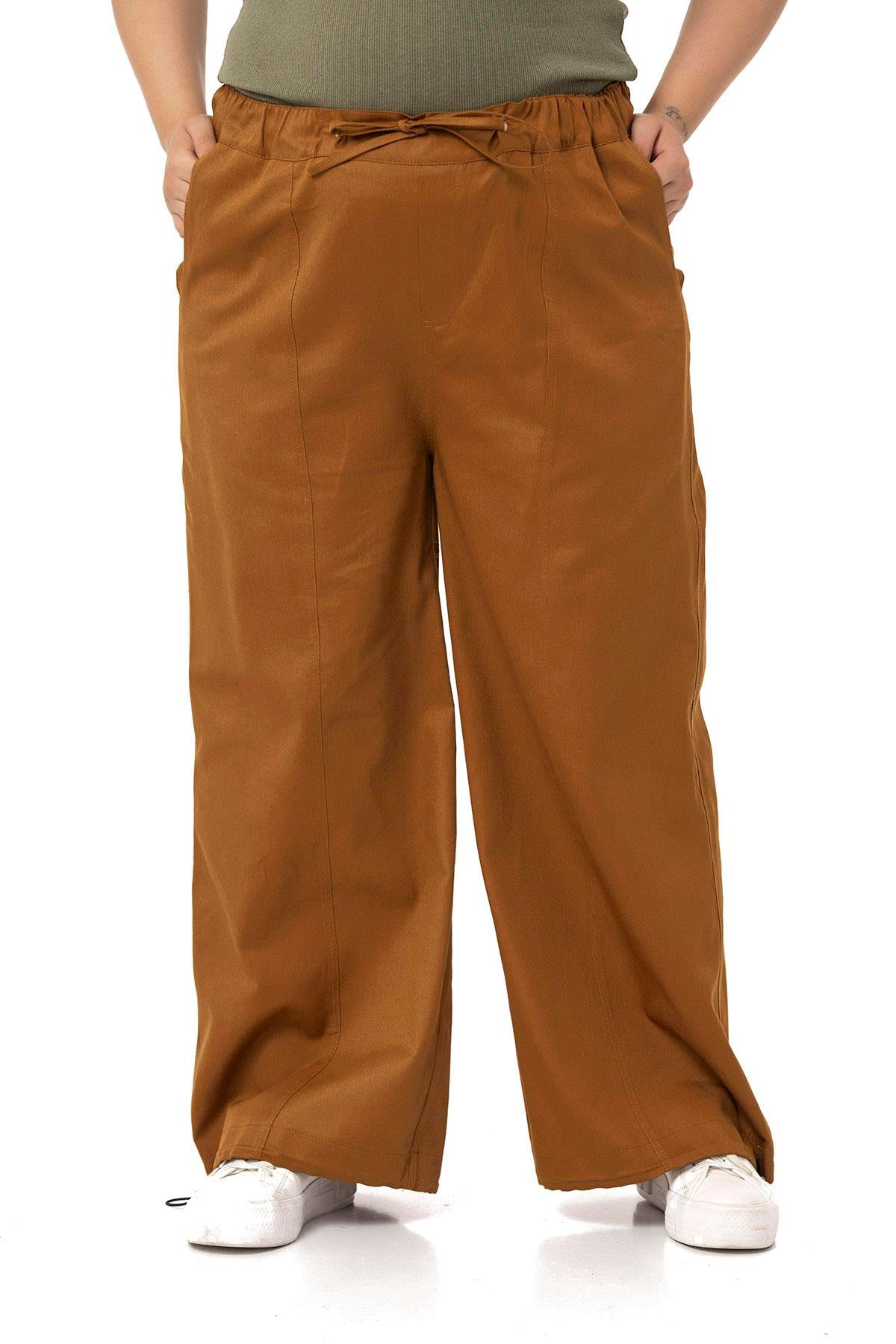 PantolonDISENTIS MODEST GENC BUYUK BEDEN GABARDIN PANTOLONDISENTIS MODESTBüyük Beden Geniş Paça Bağlama Detaylı Gabardin Tarçın Pantolon