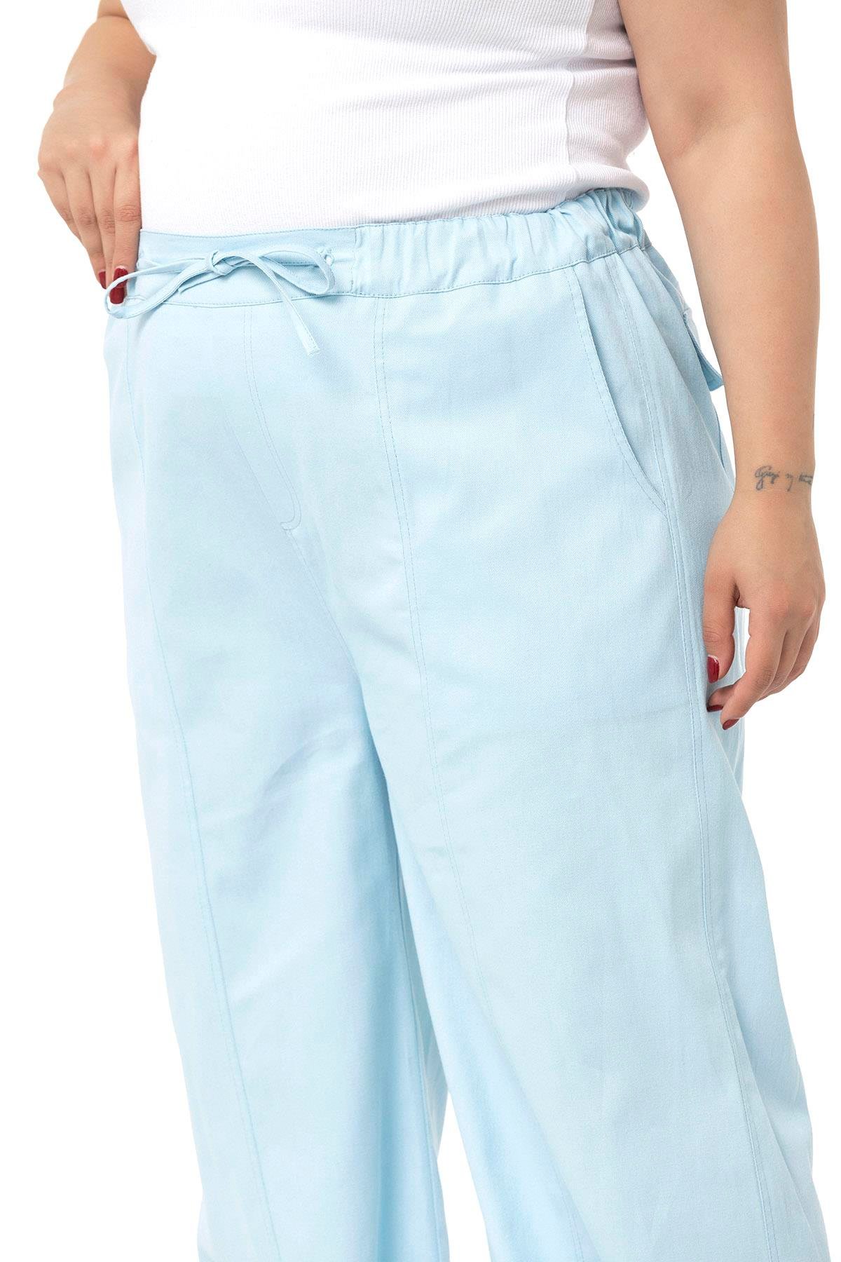 PantolonDISENTIS MODEST GENC BUYUK BEDEN GABARDIN PANTOLONDISENTIS MODESTBüyük Beden Geniş Paça Bağlama Detaylı Gabardin Bebe Mavi Pantolon