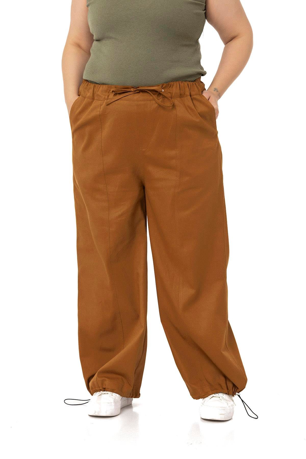 PantolonDISENTIS MODEST GENC BUYUK BEDEN GABARDIN PANTOLONDISENTIS MODESTBüyük Beden Geniş Paça Bağlama Detaylı Gabardin Tarçın Pantolon