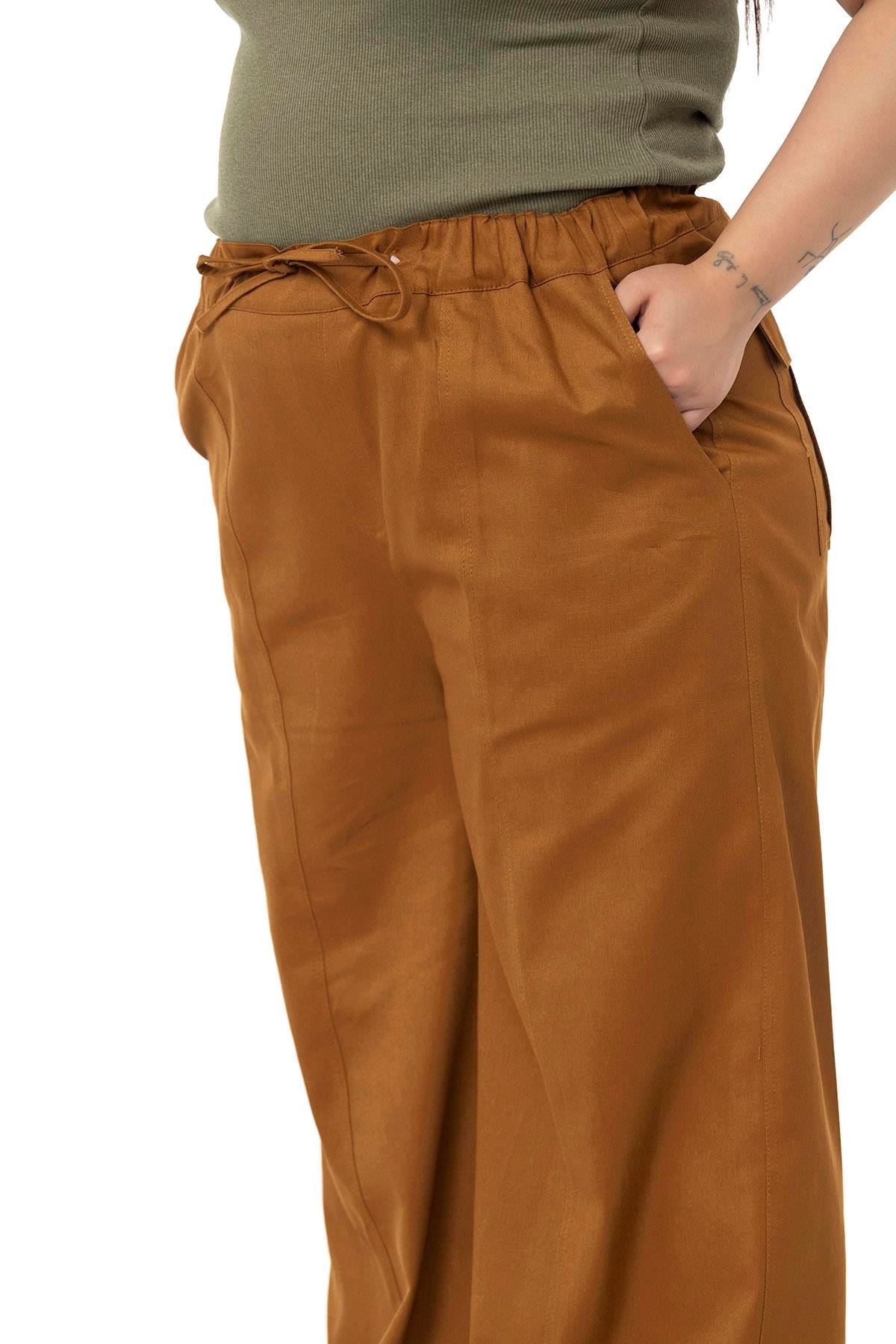PantolonDISENTIS MODEST GENC BUYUK BEDEN GABARDIN PANTOLONDISENTIS MODESTBüyük Beden Geniş Paça Bağlama Detaylı Gabardin Tarçın Pantolon