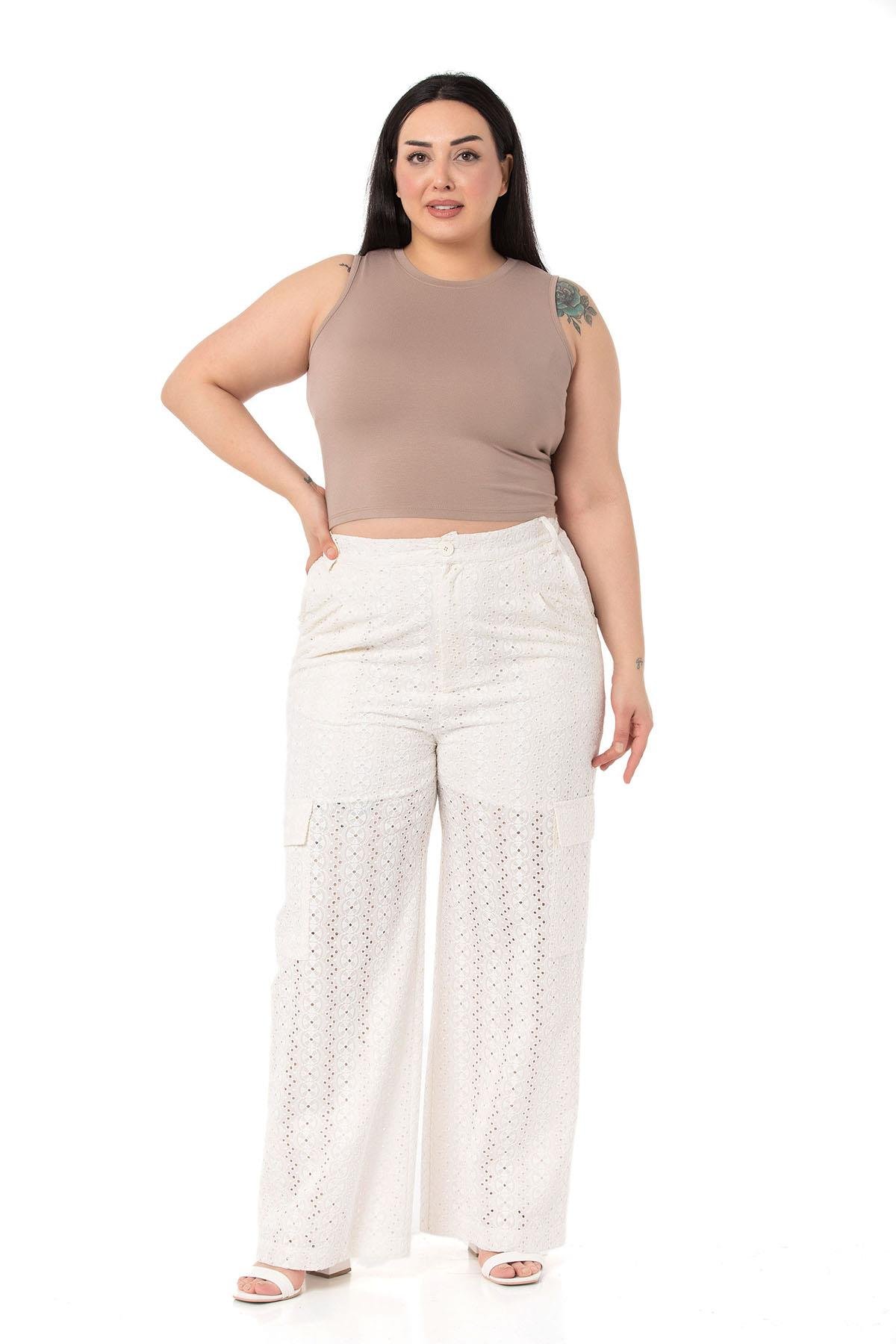 TEK KALANLARDisentis Modest Sıfır Kol Kapüşonlu Crop Bluz ve Maksi Boy Düğme Süslemeli Dar Etek Mint İkili TakımDISENTIS MODESTBüyük Beden Arkası Lastikli Yarım Astarlı Boru Paça Beyaz Pantolon