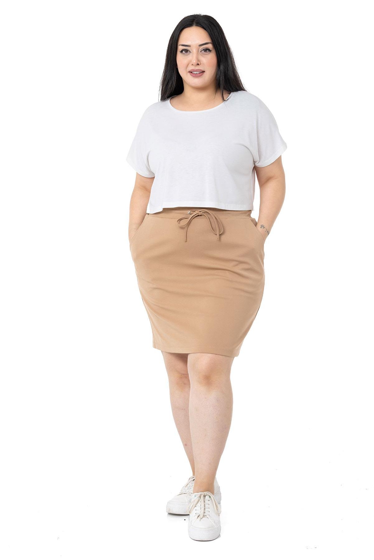 TEK KALANLARBüyük Beden Beli Lastikli ve Bağcıklı Cepli Mini Vizon EtekDISENTIS MODESTBüyük Beden Beli Lastikli ve Bağcıklı Cepli Mini Vizon Etek