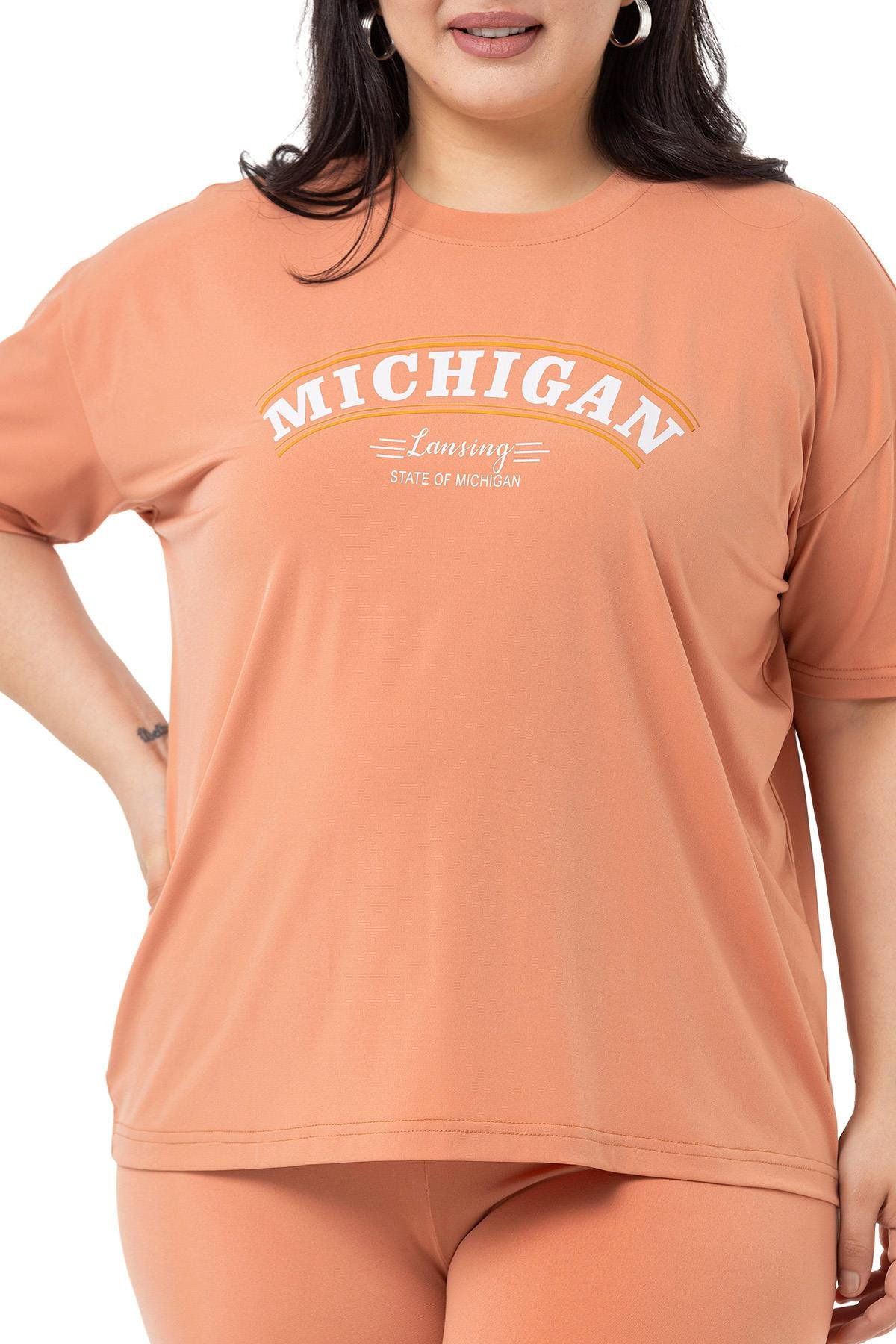 TEK KALANLARBüyük Beden Bisiklet Yaka Yarım Kol Tshirt ve Kısa Tayt Somon Rengi İkili TakımDISENTIS MODESTBüyük Beden Bisiklet Yaka Yarım Kol Penye ve Kısa Tayt Somon Rengi İkili Takım