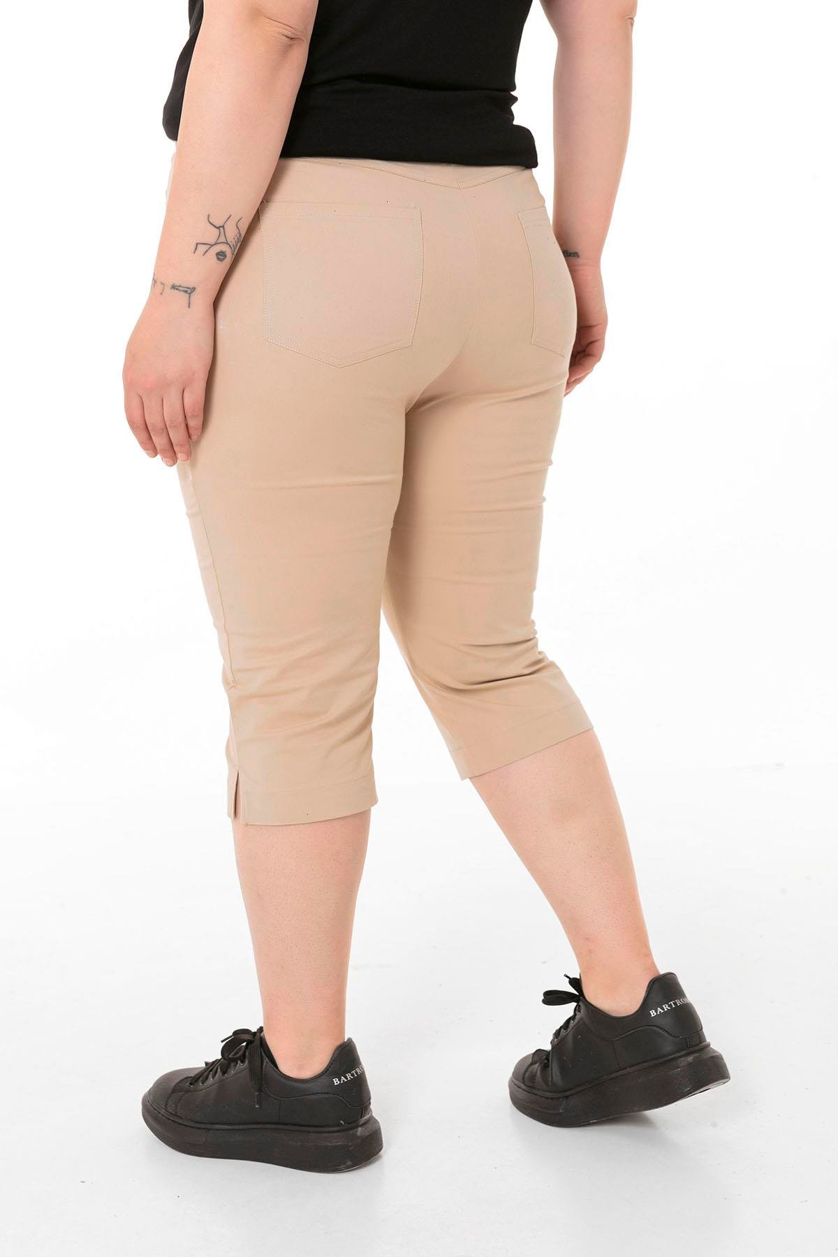 TEK KALANLARDisentis Modest Cepli Model Paçalar Yırtmaçlı Bej Capri PantolonDISENTIS MODESTBüyük Beden Cepli Model Paçalar Yırtmaçlı Bej Capri Pantolon