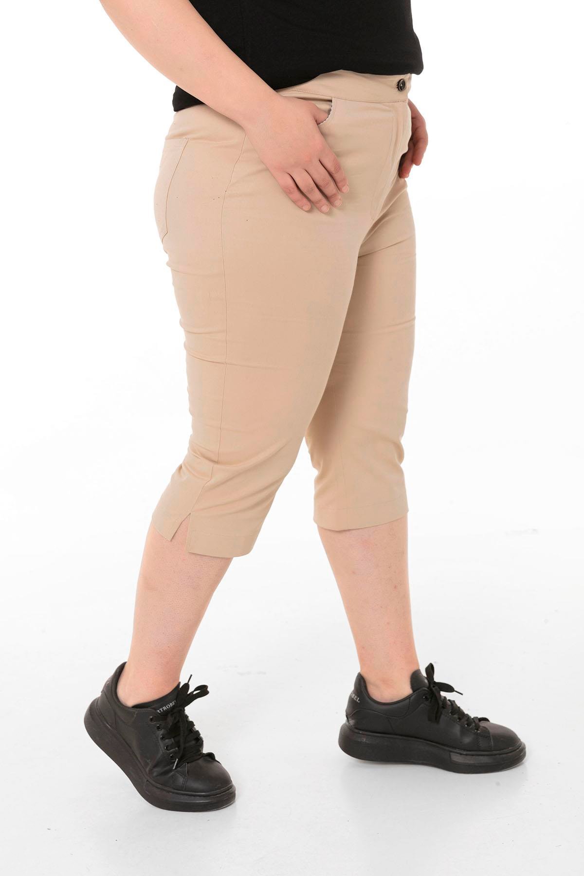 TEK KALANLARDisentis Modest Cepli Model Paçalar Yırtmaçlı Bej Capri PantolonDISENTIS MODESTBüyük Beden Cepli Model Paçalar Yırtmaçlı Bej Capri Pantolon
