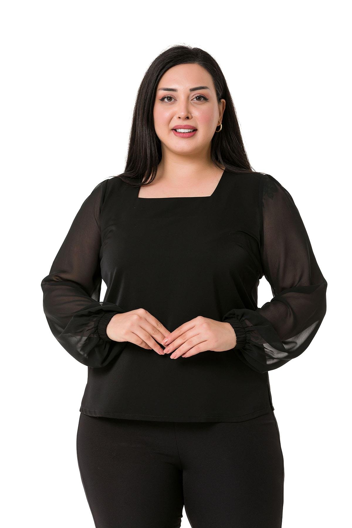 TEK KALANLARBüyük Beden Kare Yaka Kolları Şifon Yanları Yırtmaçlı Siyah Saten BluzDISENTIS MODESTBüyük Beden Kare Yaka Kolları Şifon Yanları Yırtmaçlı Siyah Saten Bluz