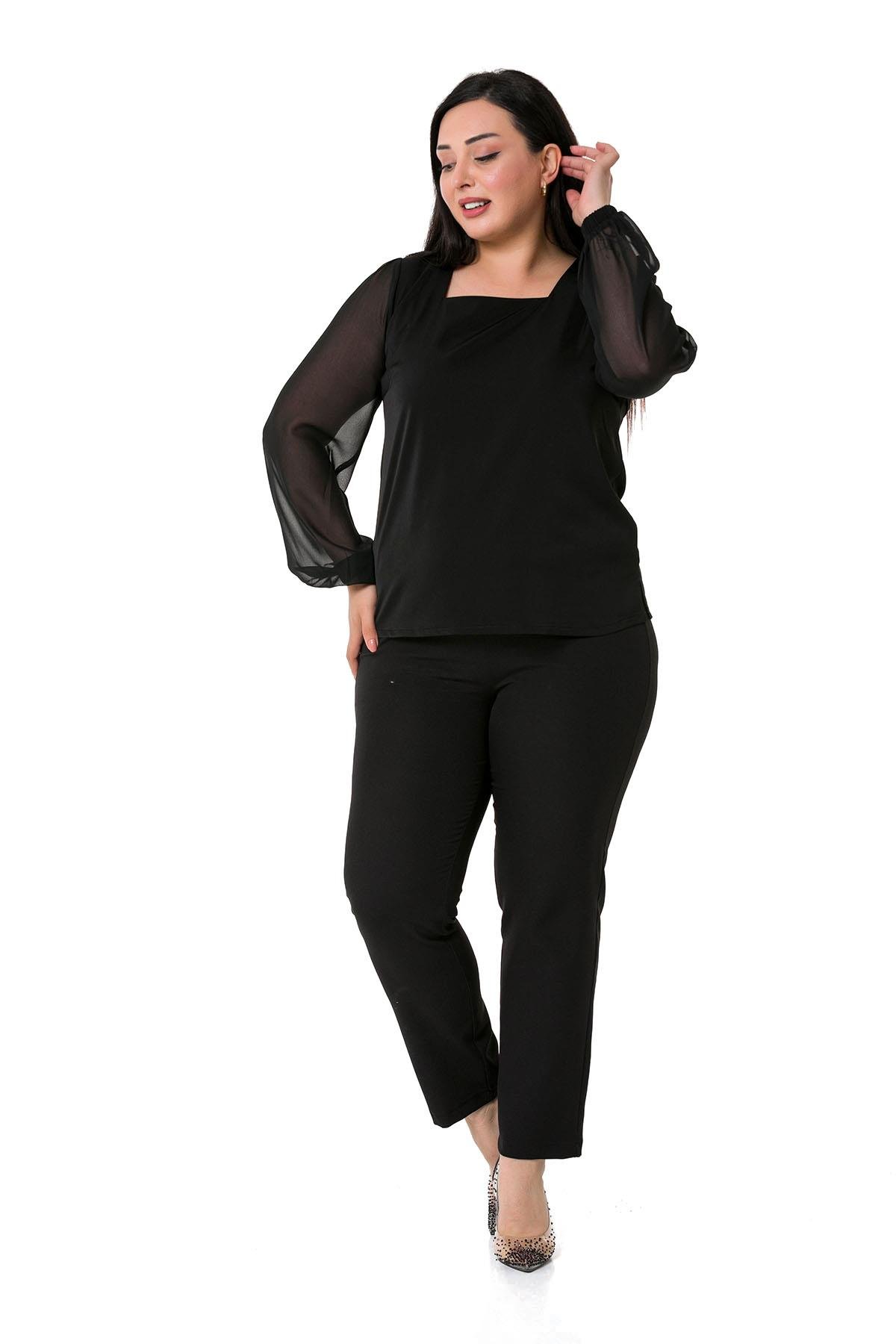 TEK KALANLARBüyük Beden Kare Yaka Kolları Şifon Yanları Yırtmaçlı Siyah Saten BluzDISENTIS MODESTBüyük Beden Kare Yaka Kolları Şifon Yanları Yırtmaçlı Siyah Saten Bluz