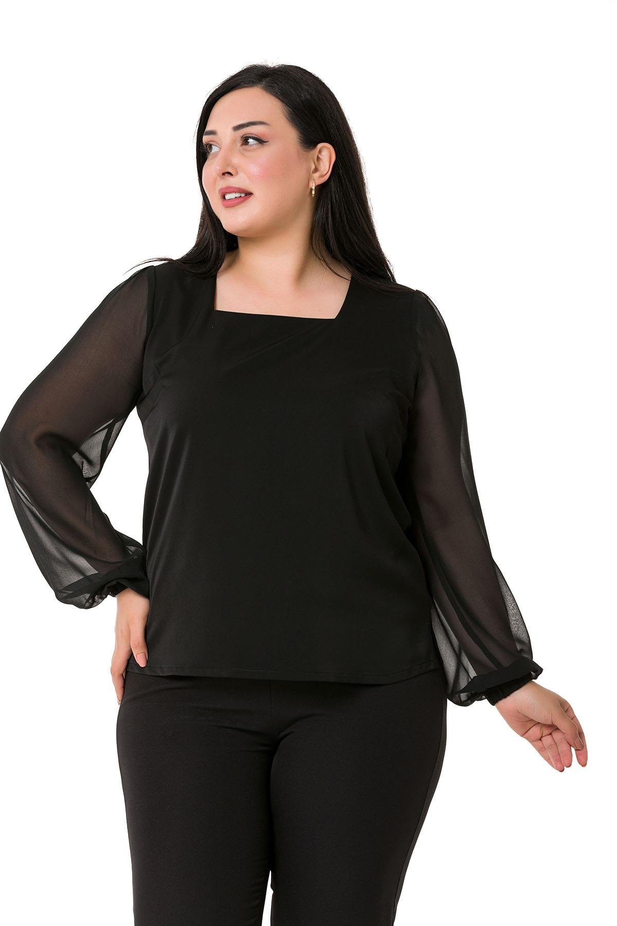 TEK KALANLARBüyük Beden Kare Yaka Kolları Şifon Yanları Yırtmaçlı Siyah Saten BluzDISENTIS MODESTBüyük Beden Kare Yaka Kolları Şifon Yanları Yırtmaçlı Siyah Saten Bluz