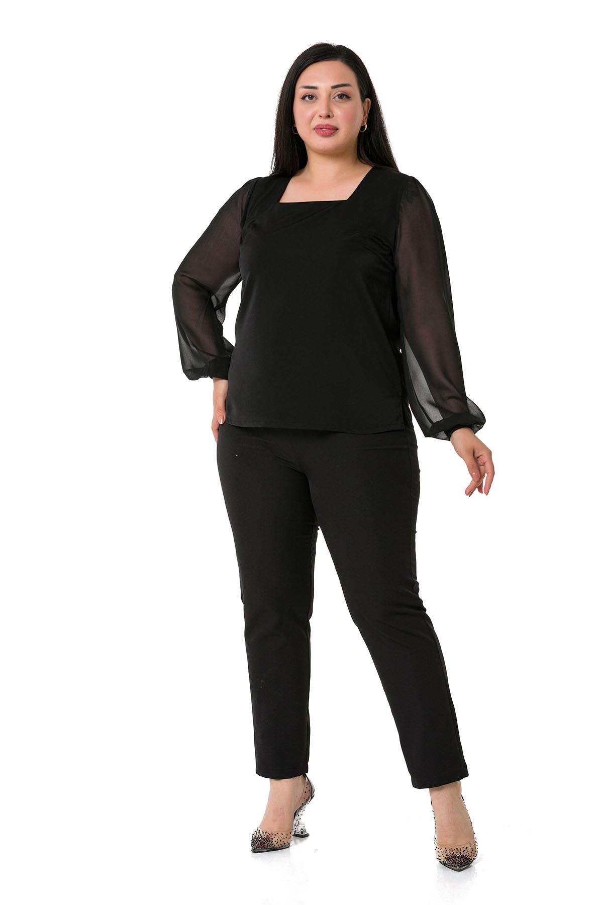 TEK KALANLARBüyük Beden Kare Yaka Kolları Şifon Yanları Yırtmaçlı Siyah Saten BluzDISENTIS MODESTBüyük Beden Kare Yaka Kolları Şifon Yanları Yırtmaçlı Siyah Saten Bluz