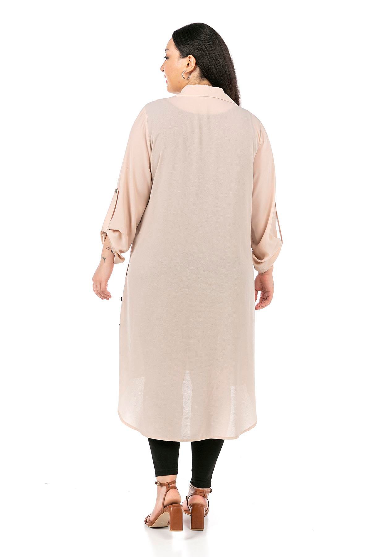 TEK KALANLARBüyük Beden Katlamalı Kollu Yanları Düğmeli Uzun Krem Tunik GömlekDISENTIS MODESTBüyük Beden Katlamalı Kollu Yanları Düğmeli Uzun Krem Tunik Gömlek