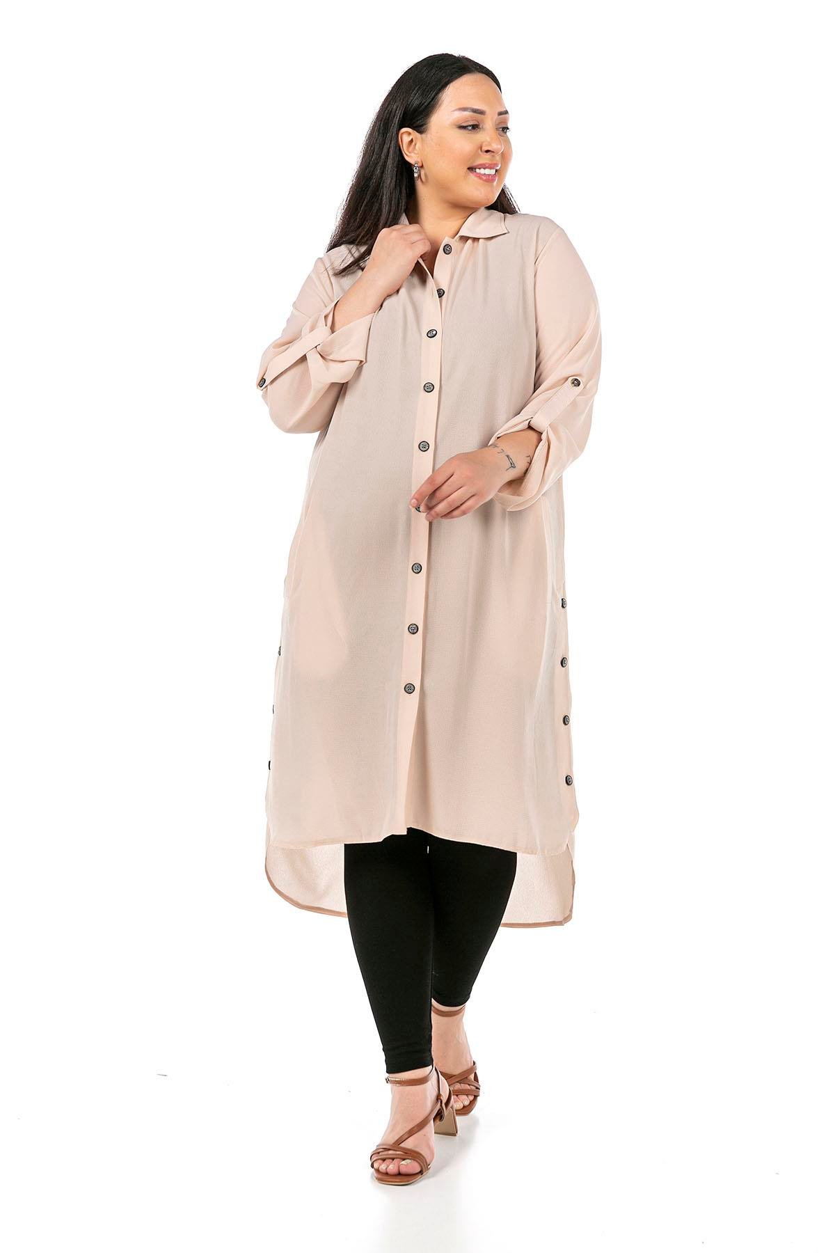 TEK KALANLARBüyük Beden Katlamalı Kollu Yanları Düğmeli Uzun Krem Tunik GömlekDISENTIS MODESTBüyük Beden Katlamalı Kollu Yanları Düğmeli Uzun Krem Tunik Gömlek