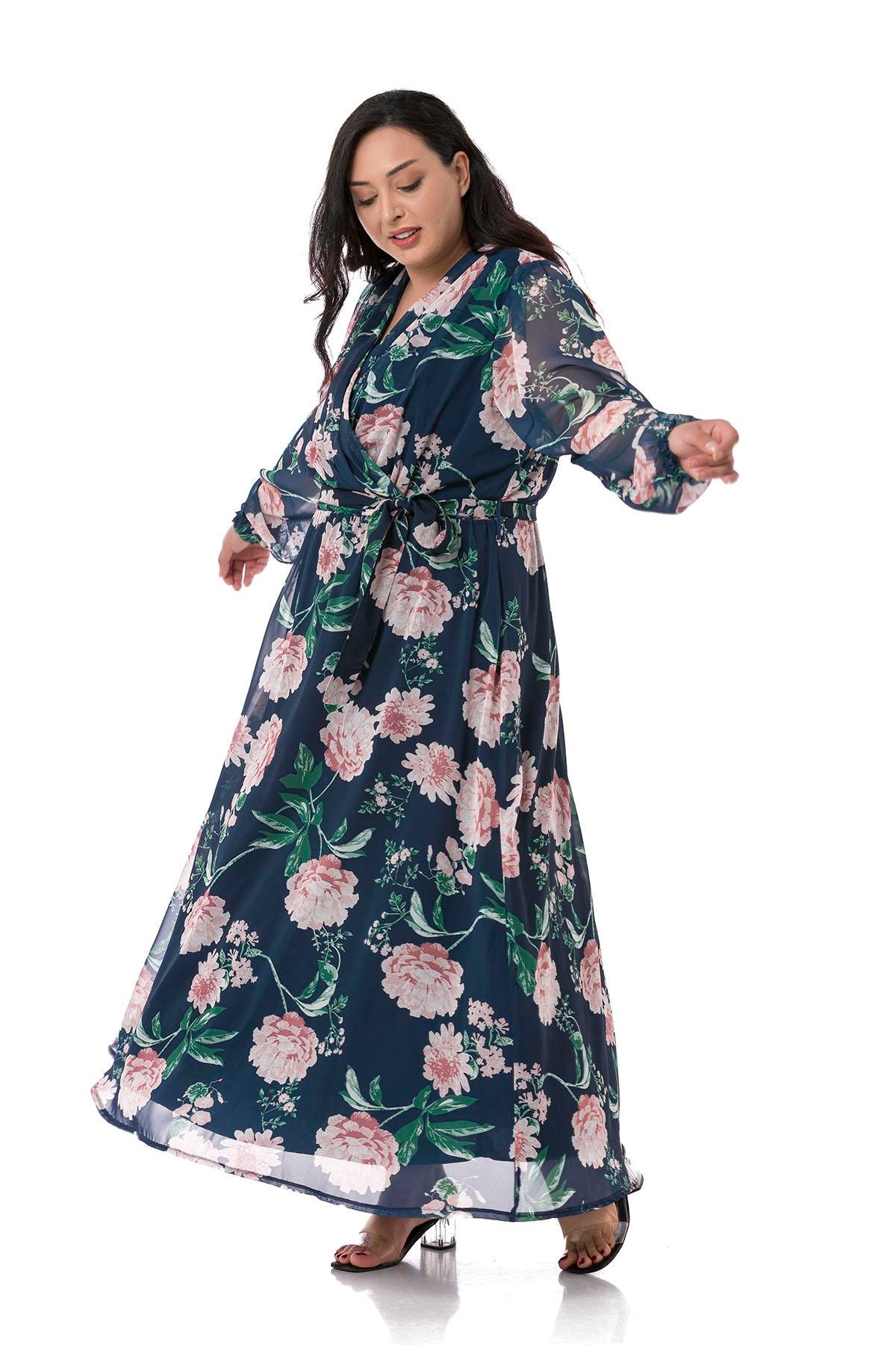 TEK KALANLARBüyük Beden Kruvaze Yaka Astarlı Beli Lastikli ve Kuşaklı Maksi Boy Çiçek Desenli Mavi Şifon ElbiseDISENTIS MODESTBüyük Beden Kruvaze Yaka Astarlı Beli Lastikli ve Kuşaklı Maksi Boy Çiçek Desenli Mavi Şifon Elbise