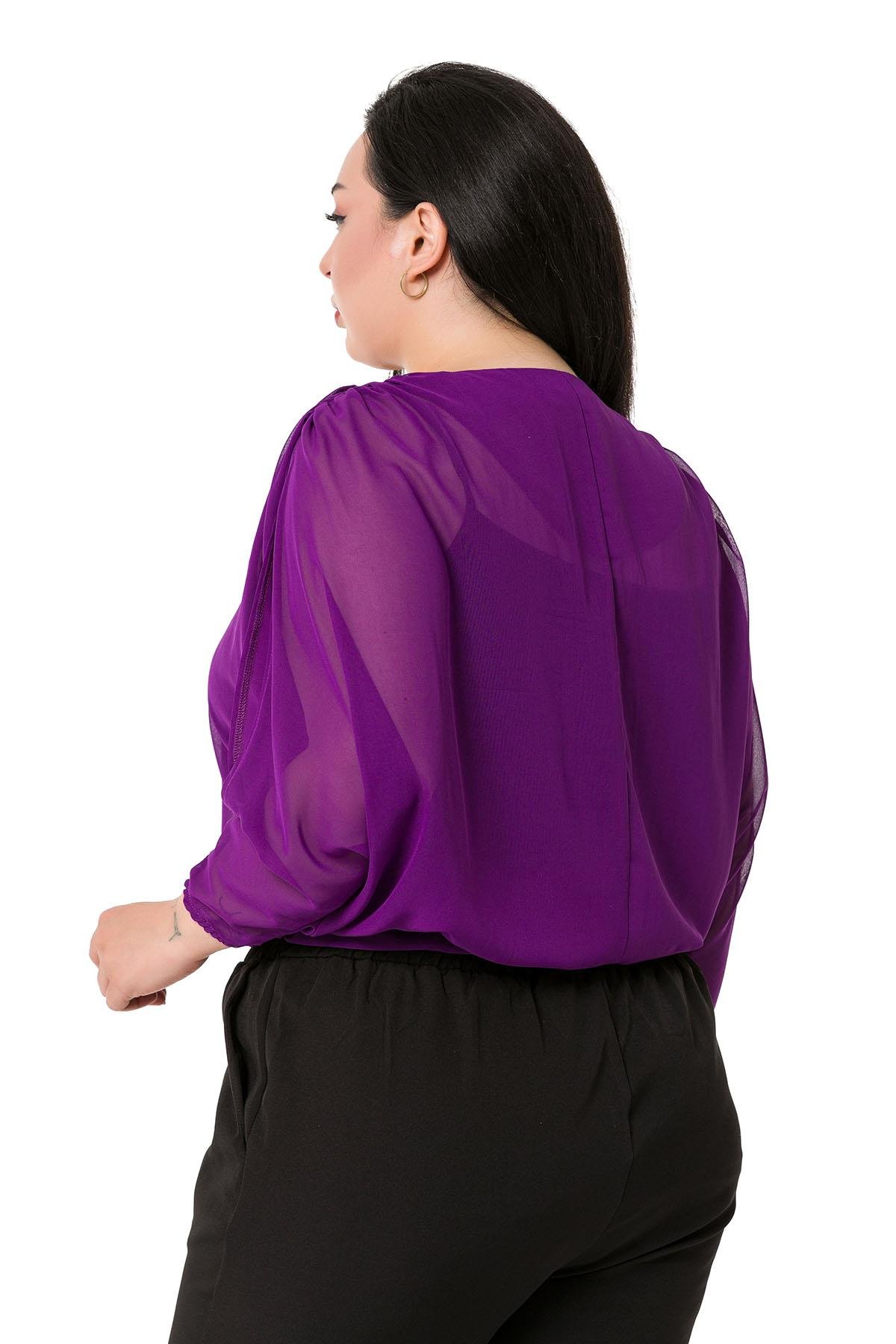 TEK KALANLARBüyük Beden V Yaka Koldan Dekolteli Beli Lastikli Mor Şifon BluzDISENTIS MODESTBüyük Beden V Yaka Koldan Dekolteli Beli Lastikli Mor Şifon Bluz