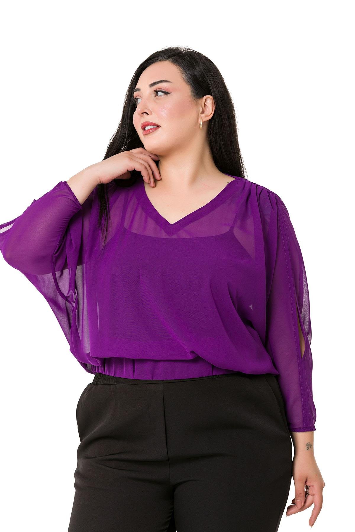 TEK KALANLARBüyük Beden V Yaka Koldan Dekolteli Beli Lastikli Mor Şifon BluzDISENTIS MODESTBüyük Beden V Yaka Koldan Dekolteli Beli Lastikli Mor Şifon Bluz