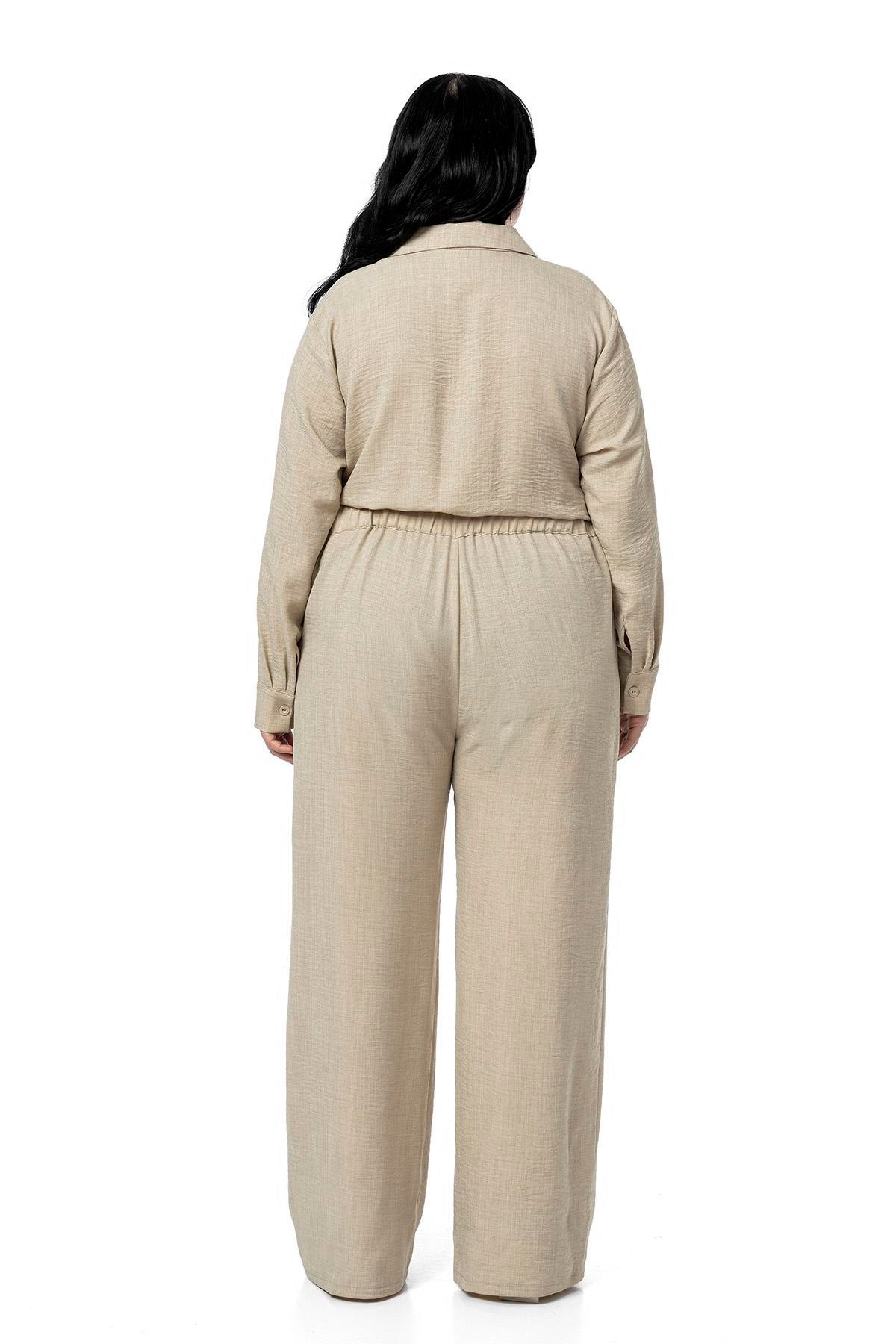 TULUMDisentis Modest Büyük Beden Beli Tünelli ve Arkadan Lastikli Geniş Paça Bej Rengi TulumDISENTIS MODESTBüyük Beden Beli Tünelli ve Arkadan Lastikli Geniş Paça Bej Rengi Tulum