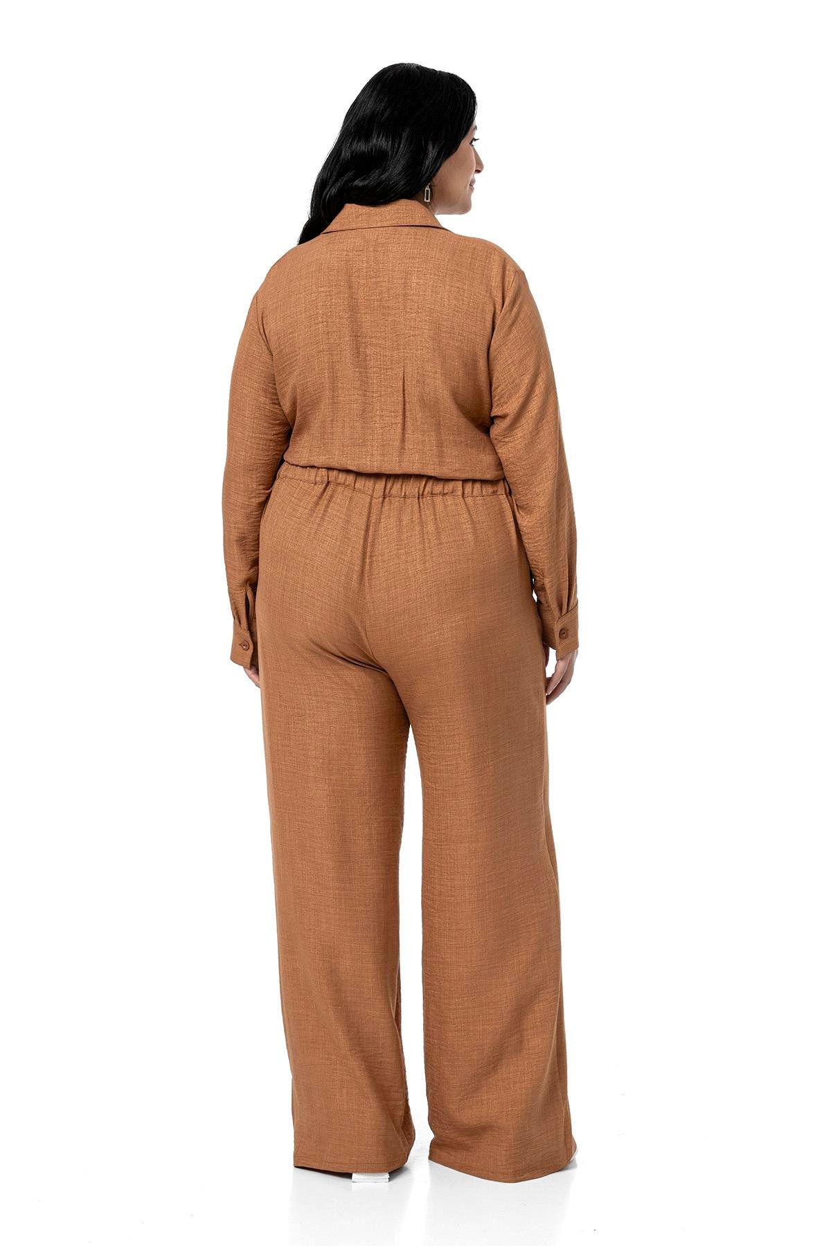 TULUMDisentis Modest Büyük Beden Beli Tünelli ve Arkadan Lastikli Geniş Paça Tarçın TulumDISENTIS MODESTBüyük Beden Beli Tünelli ve Arkadan Lastikli Geniş Paça Tarçın Tulum