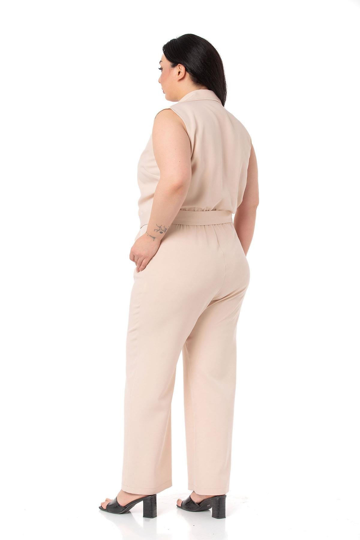 TulumDISENTIS MODEST GENC BUYUK BEDEN KRUVAZE TULUMDISENTIS MODESTBüyük Beden Kruvaze Beli Lastikli Fermuar Kapamalı Kemerli Bej Rengi Tulum