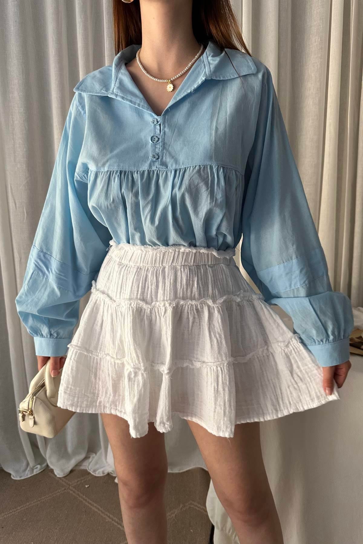 KISA PATLI BİRİT DÜĞME DETAYLI BLUZ