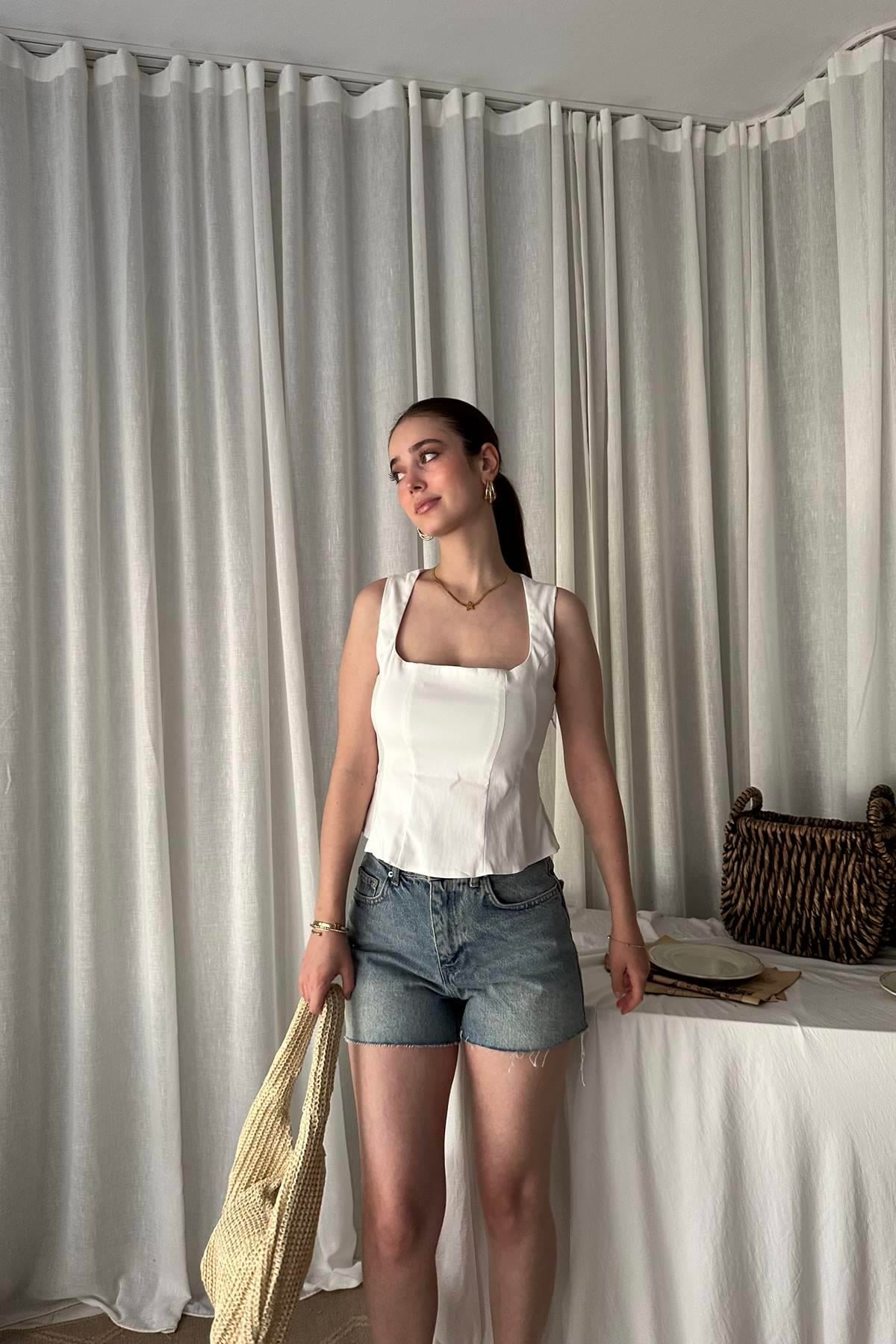 PEPLUM KORSE TOP