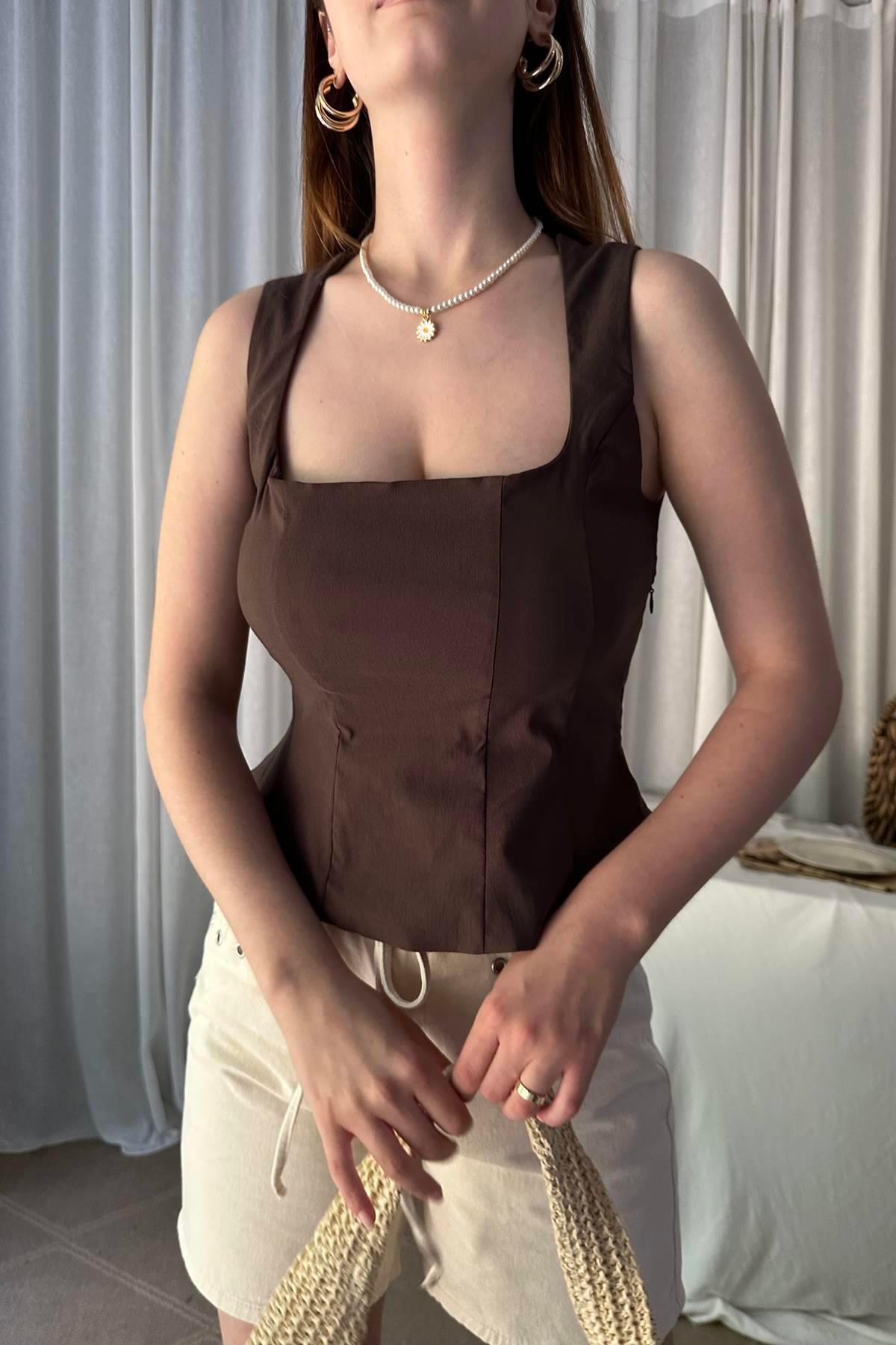 PEPLUM KORSE TOP