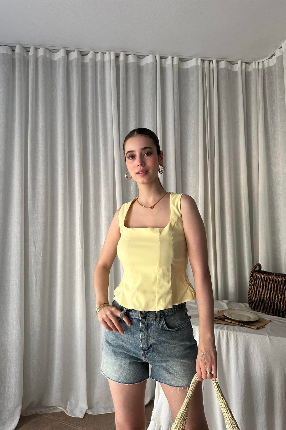 PEPLUM KORSE TOP