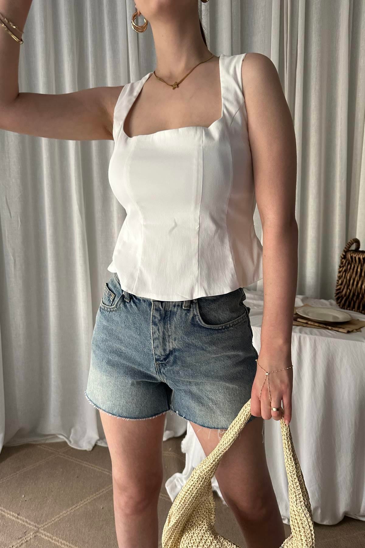 PEPLUM KORSE TOP