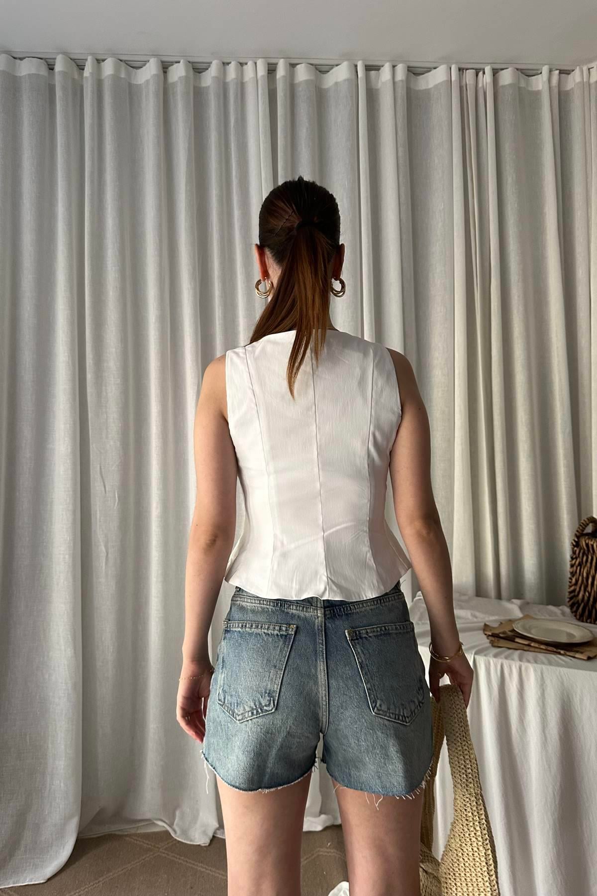 PEPLUM KORSE TOP