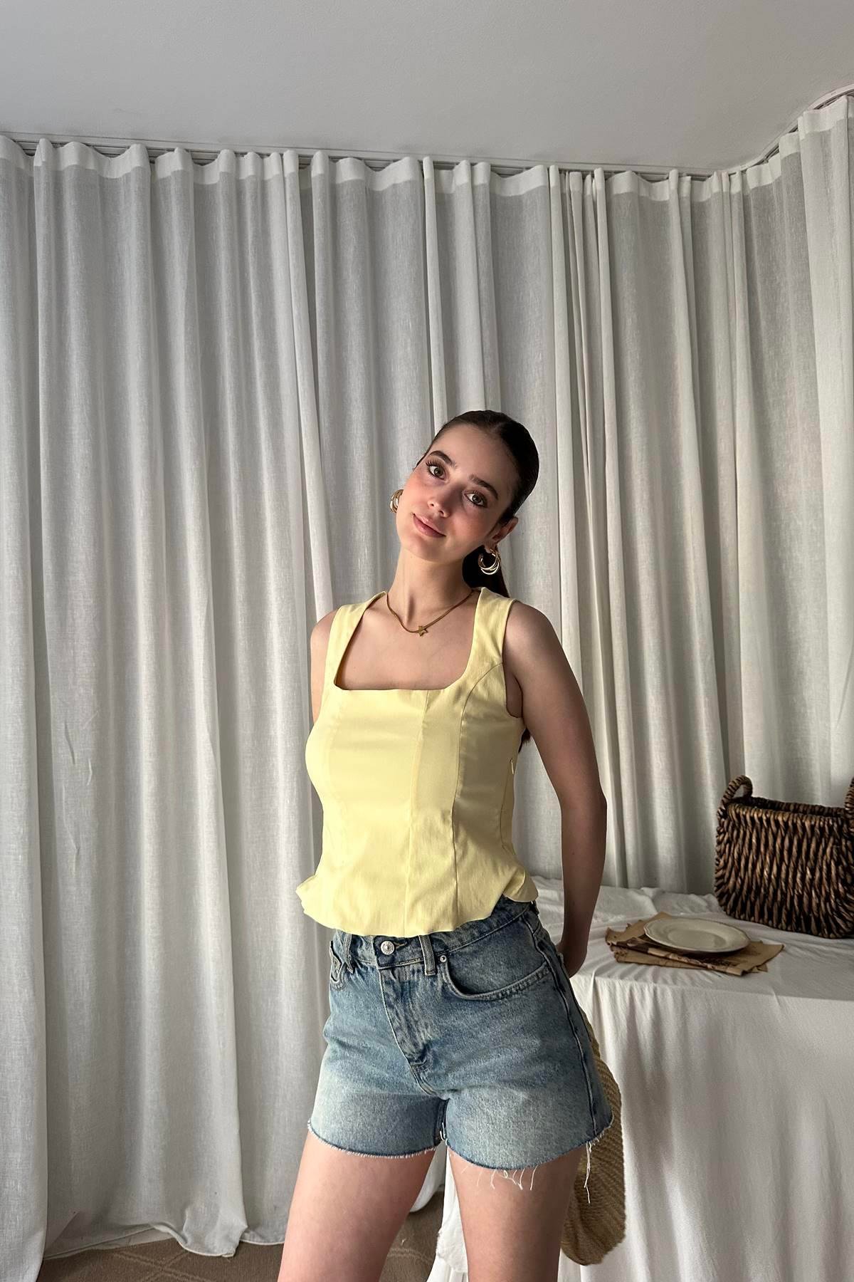 PEPLUM KORSE TOP