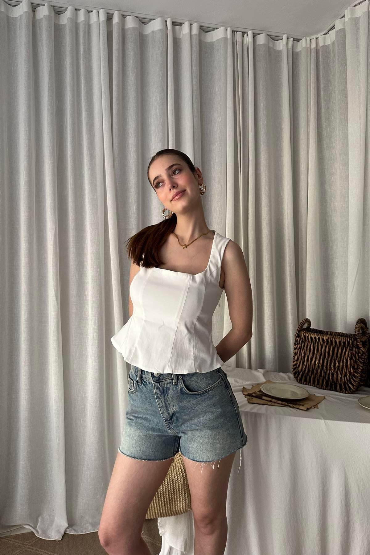 PEPLUM KORSE TOP