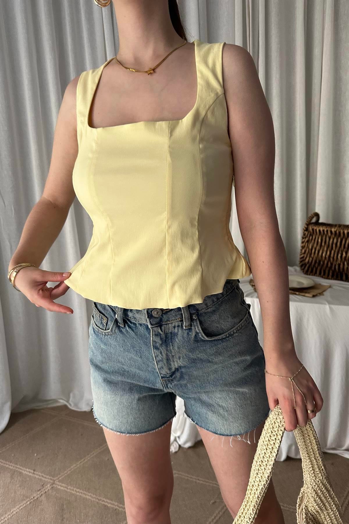 PEPLUM KORSE TOP