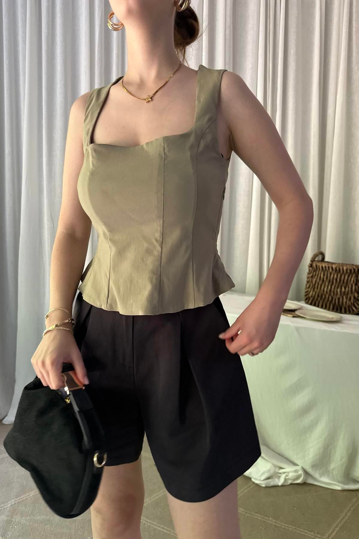 PEPLUM KORSE TOP