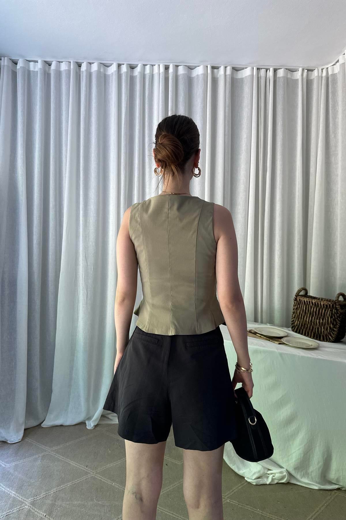 PEPLUM KORSE TOP