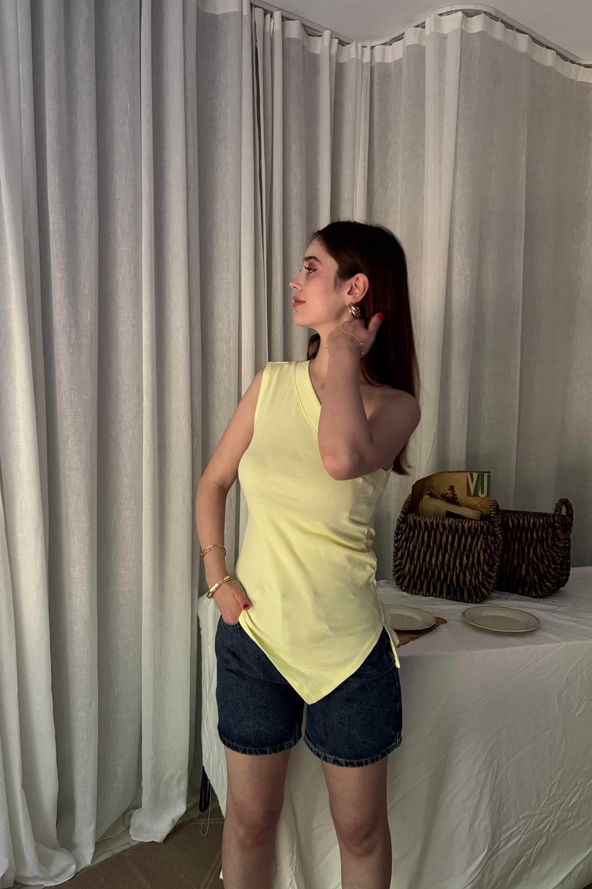 TEK OMUZLU ASİMETRİK TOP