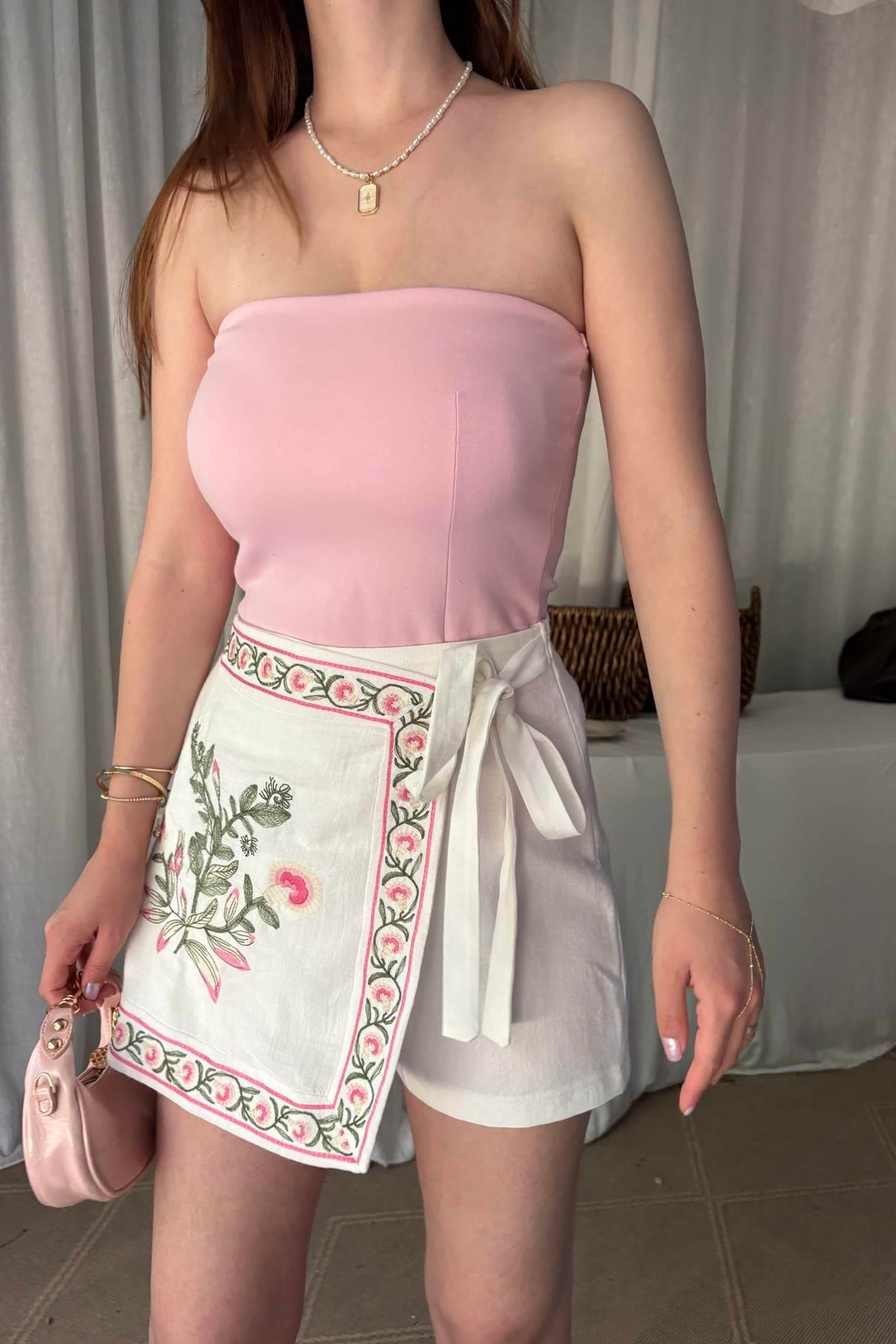 STRAPLEZ PEPLUM TOP
