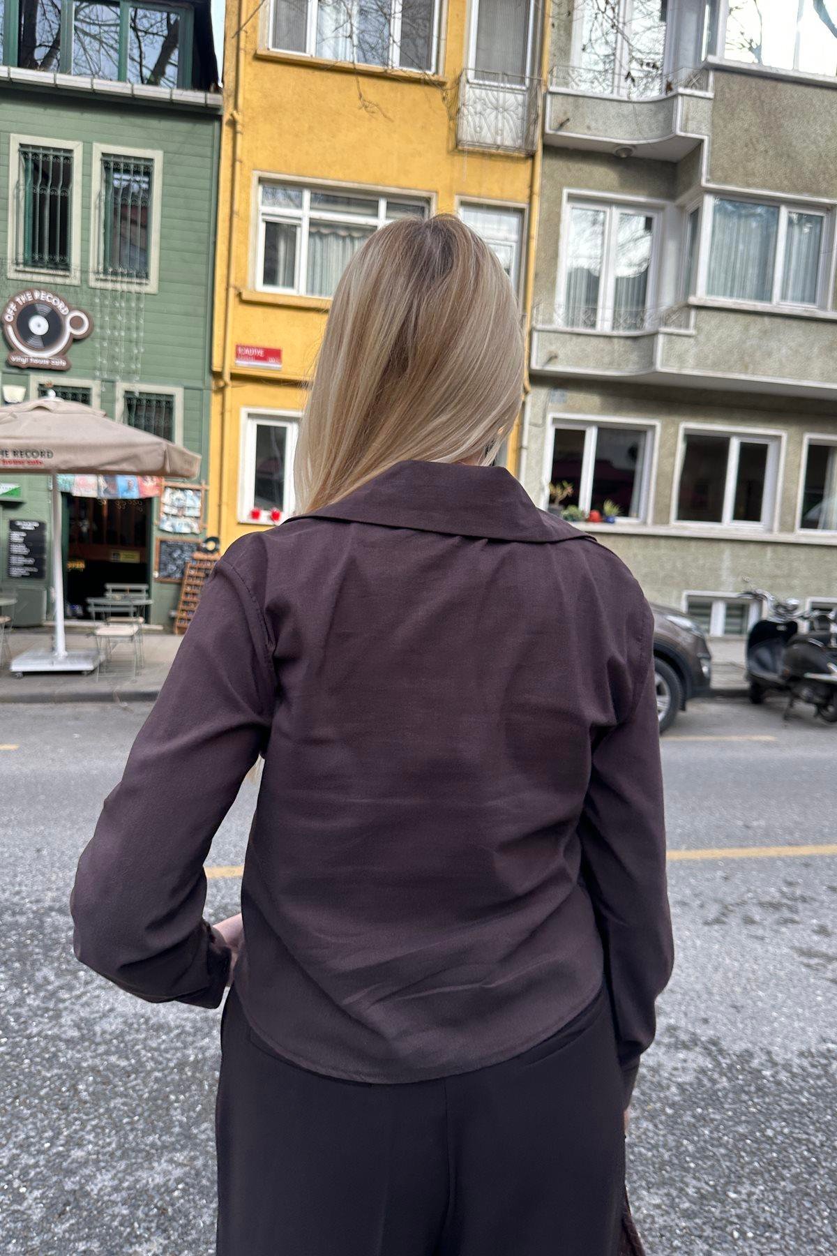 GÖĞÜS BÜZGÜ DETAYLI FERMUARLI BLUZ