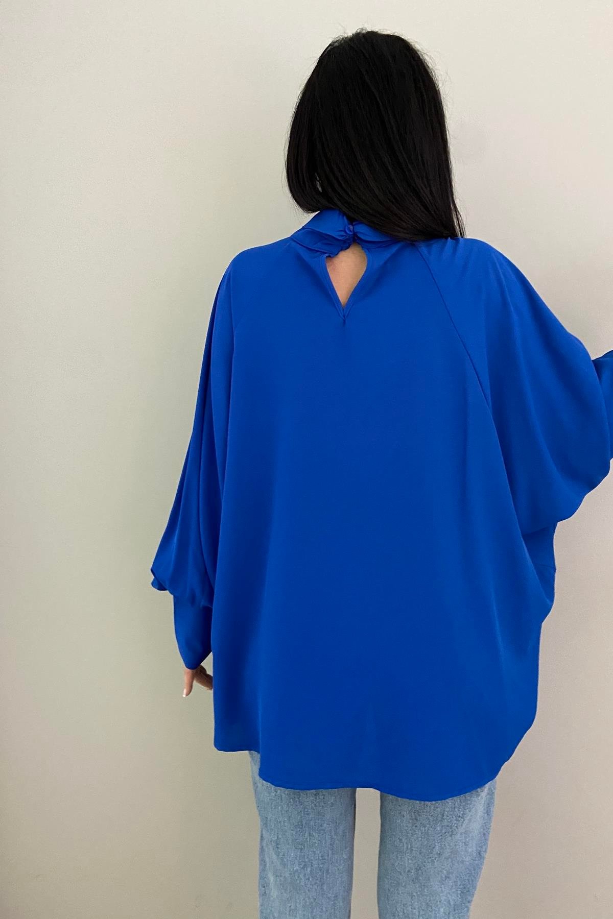REGLAN KOL YAKA BÜZGÜ DETAY OVERSİZE BLUZ